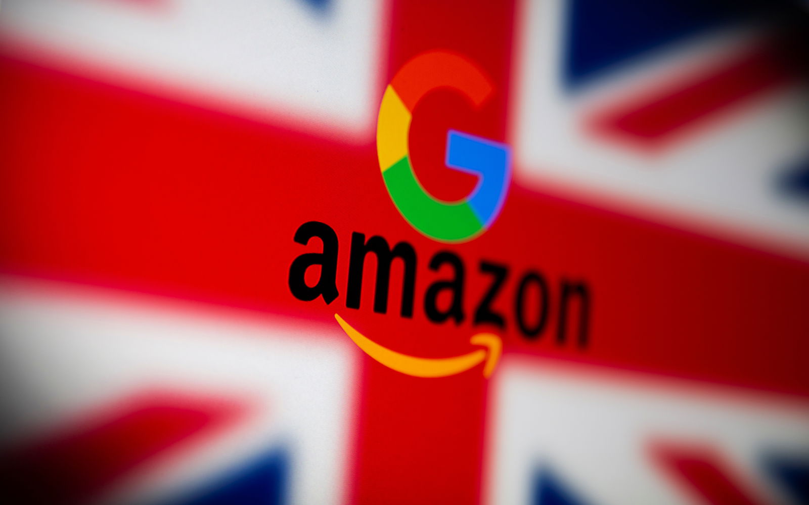 FILE PHOTO: UK flag, Google and Amazon logos are seen displayed in this illustration picture taken on June 25, 2021. REUTERS/Dado Ruvic/Illustration