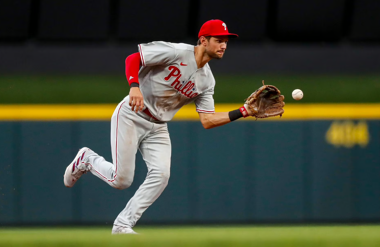 Philadelphia Phillies shortstop Trea Turner (7) grounds the ball hit by Cincinnati Reds designated hitter Wil Myers — not pictured —  in the fourth inning at Great American Ball Park in Cincinnati, Ohio, April 14, 2023.