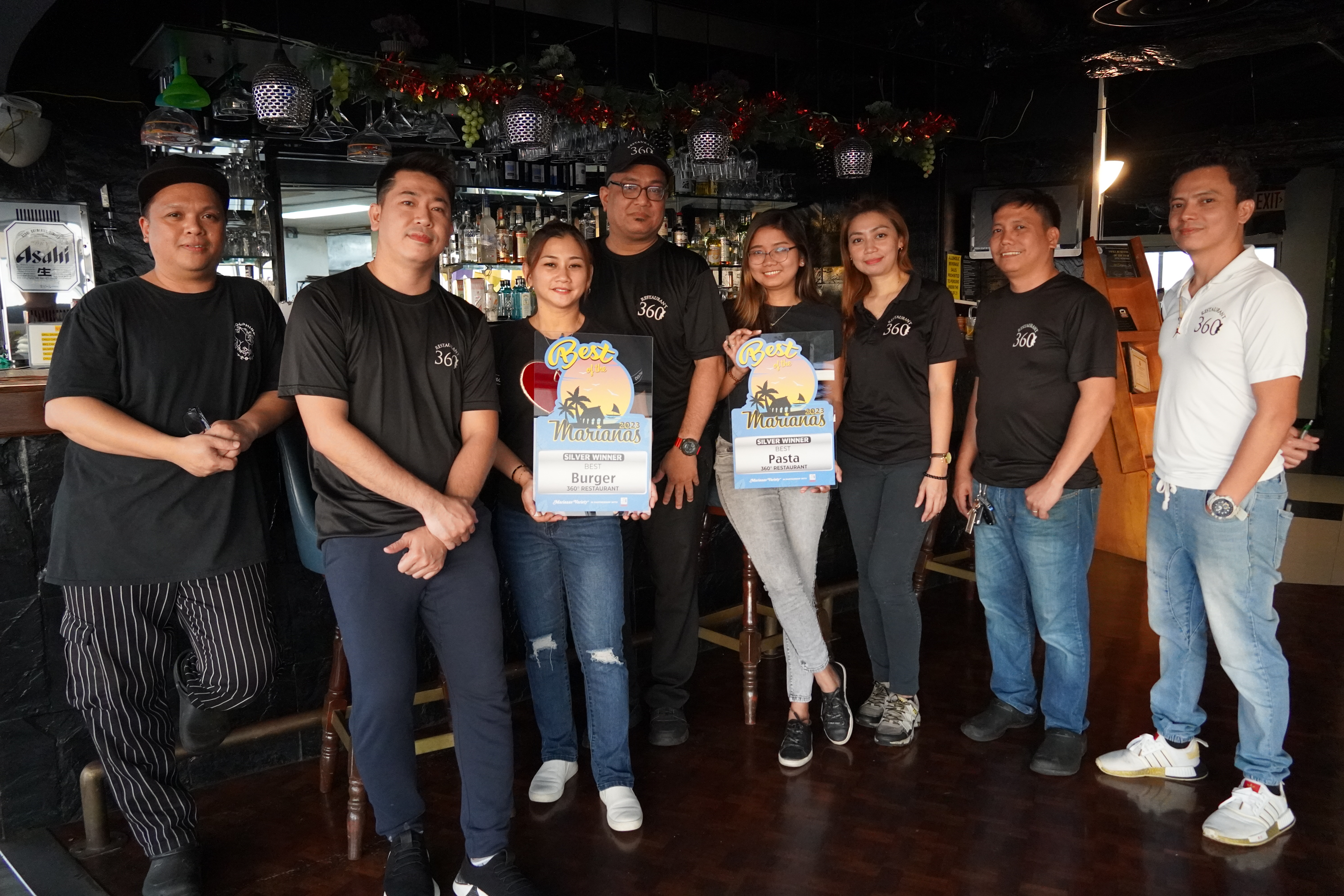 360 Restaurant staff members receive the silver award for Best Burger and Best Pasta.