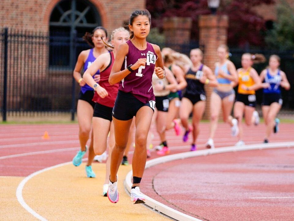 Tania Tan takes the lead during the 10K race of the 57th Colonial Relays  at William & Mary College in Williamsburg, Virginia on Saturday.