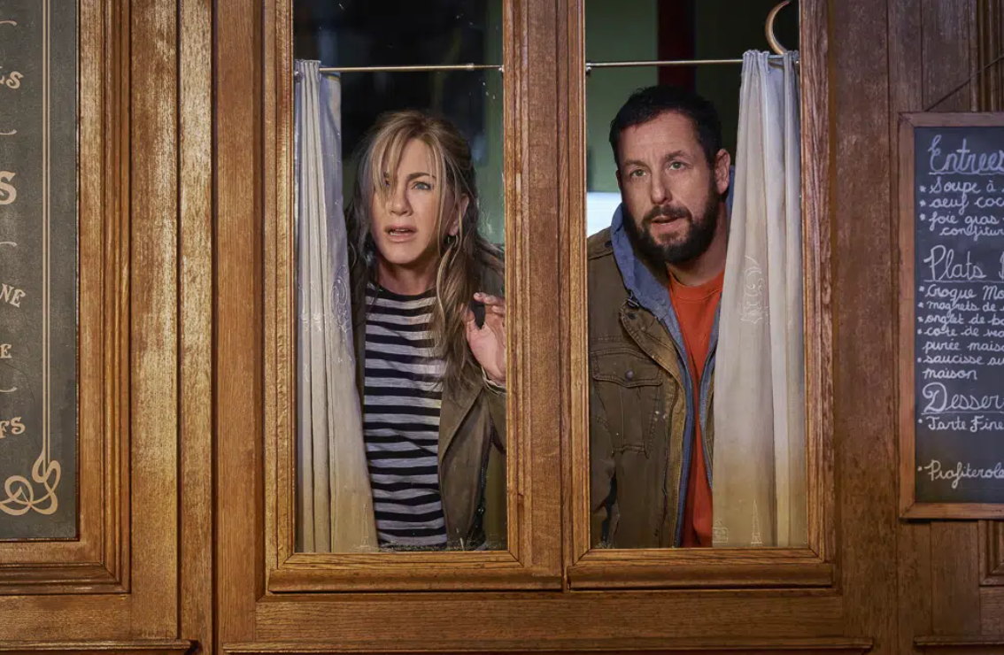 Jennifer Aniston, left, and Adam Sandler in a scene from the film "Murder Mystery 2."