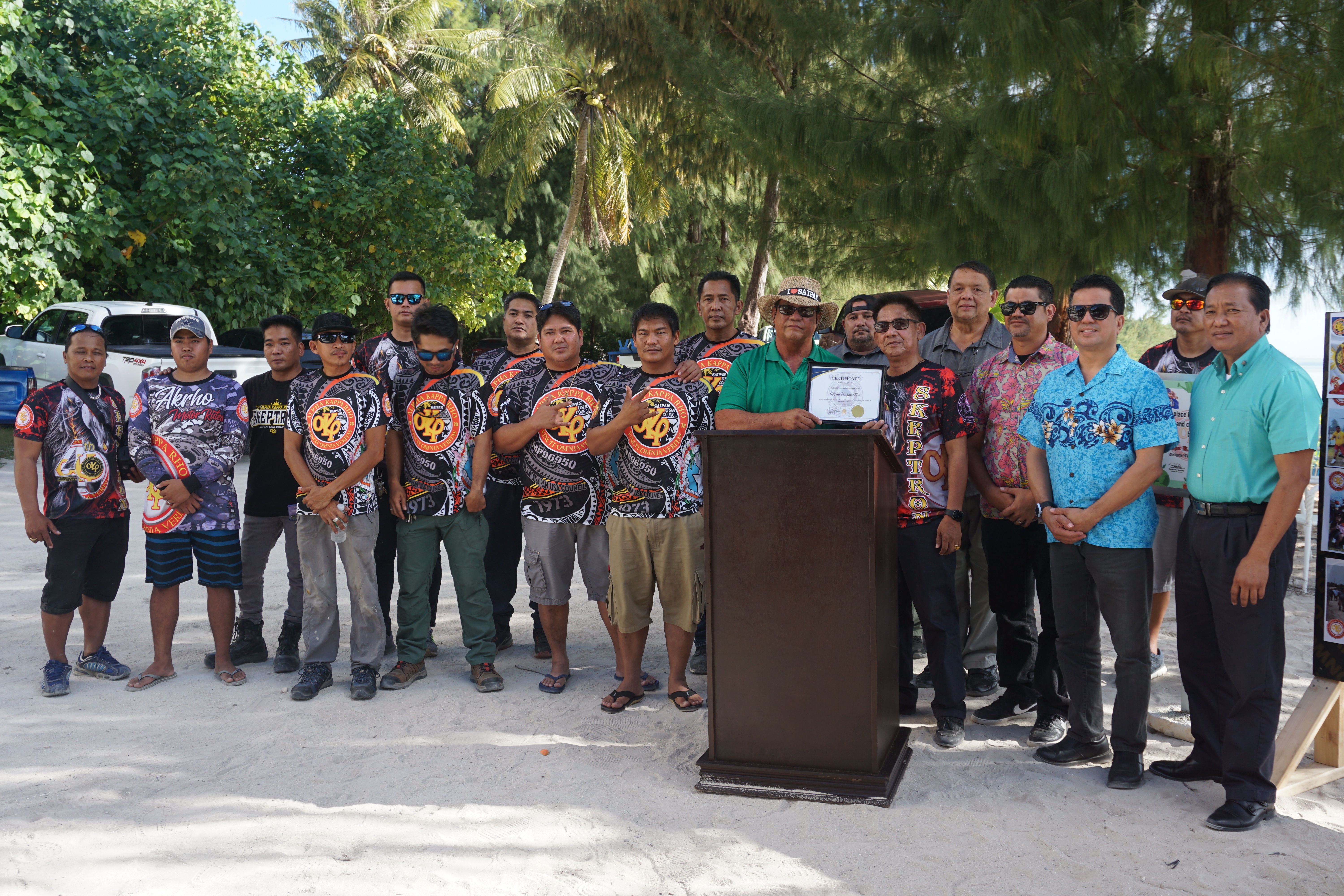 AKRHO members pose with Saipan Mayor RB Camacho, lawmakers, other CNMI officials and community members during an adopt-a place ceremony on Friday at Aquarius Beach.