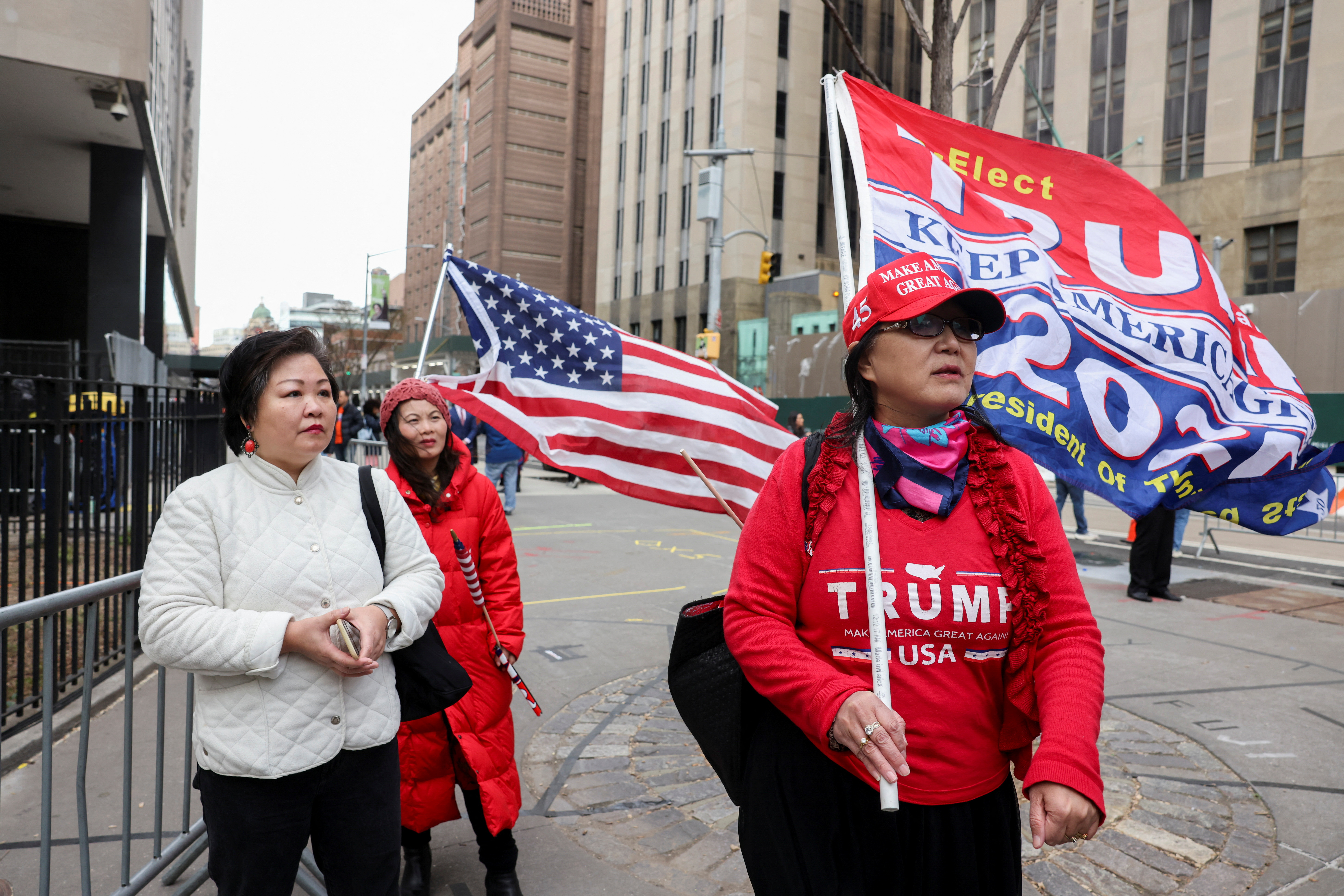 Supporters of former President Donald Trump arrive at the Manhattan Criminal Courthouse in New York City, April 3, 2023.