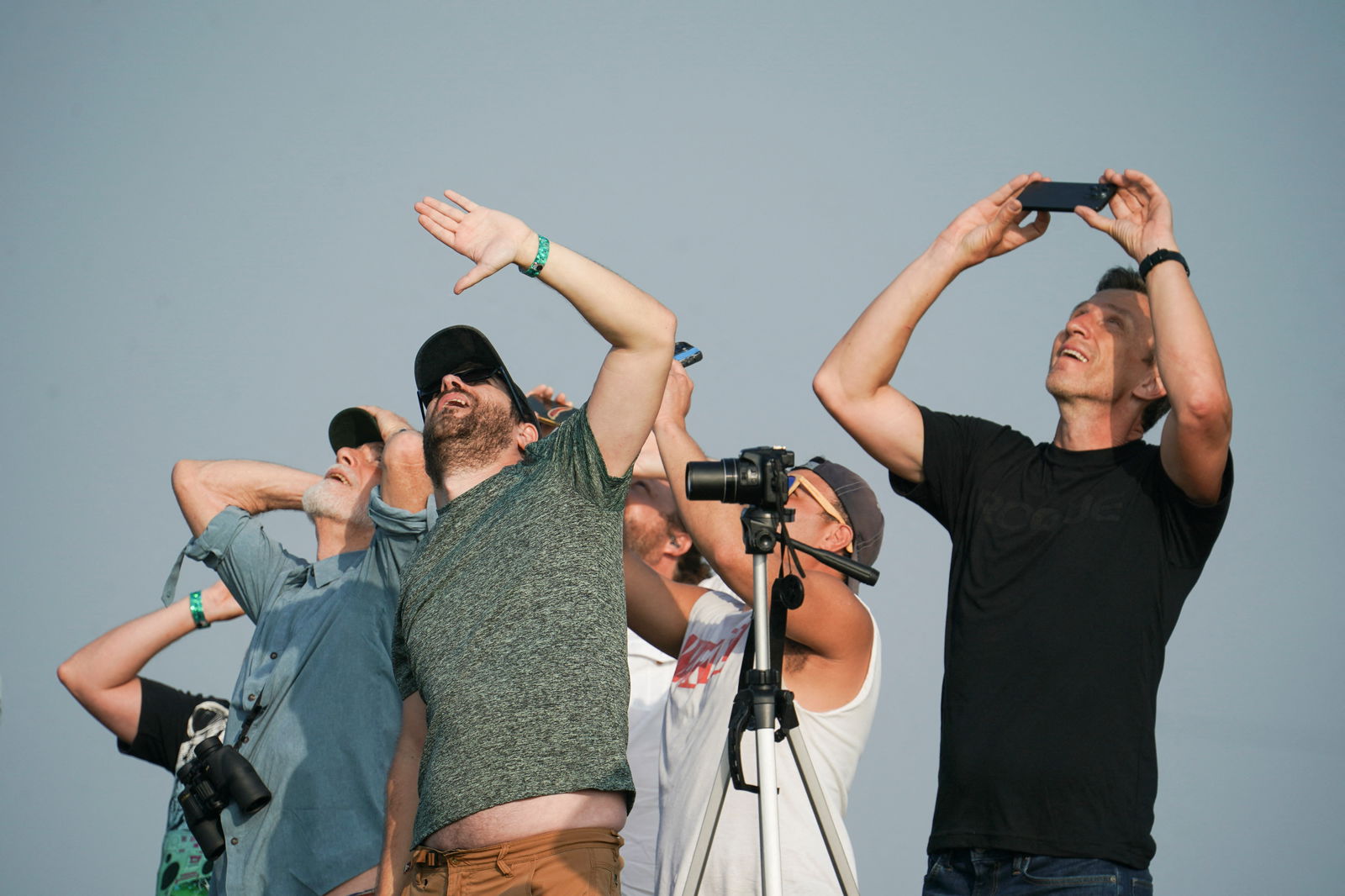 People watch as SpaceX's next-generation Starship spacecraft lifts off from the company's Boca Chica launchpad near Brownsville, Texas, U.S., April 20, 2023. REUTERS/Go Nakamura