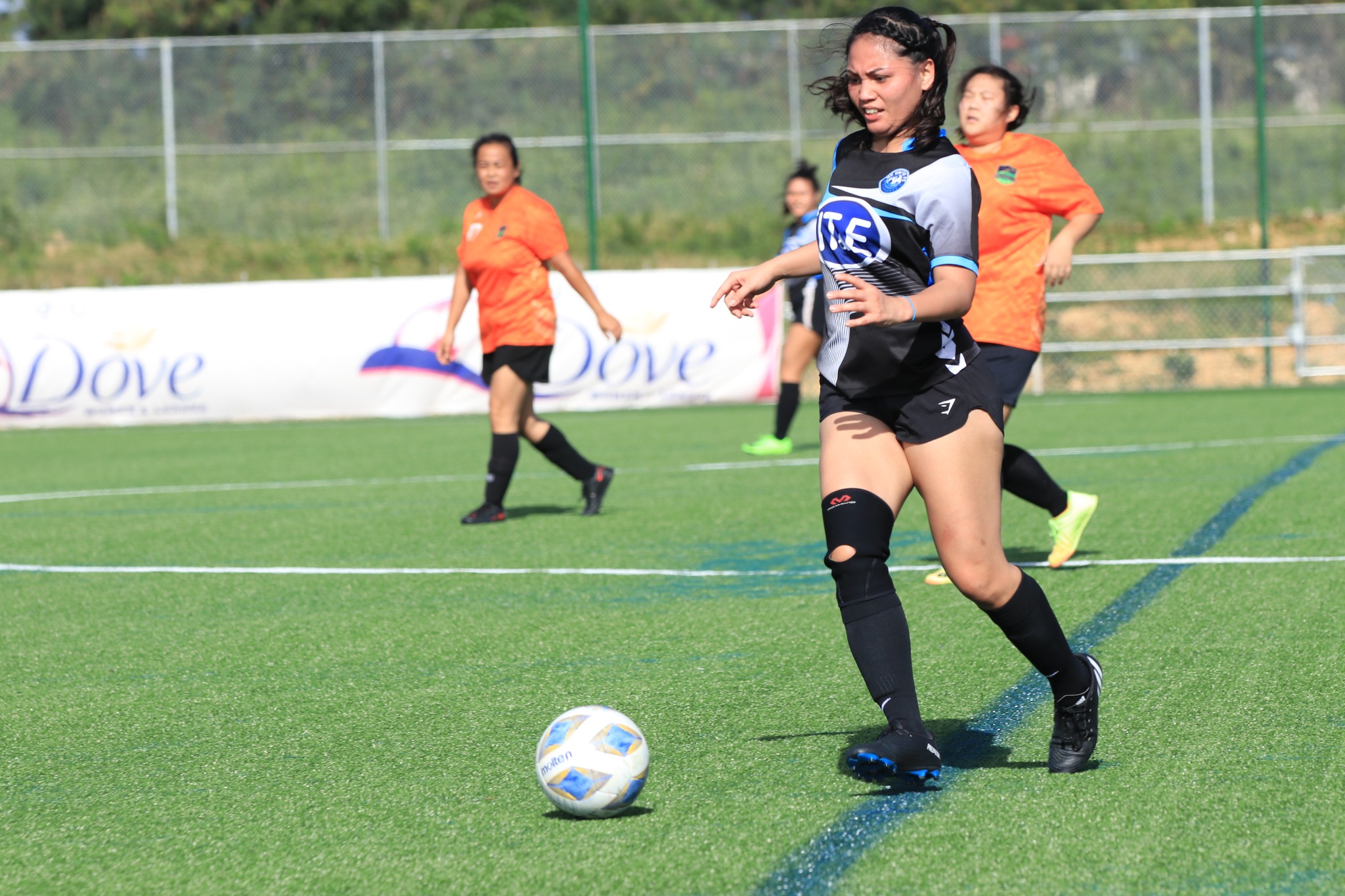 MP United's Michelle Masga sets up the play during an intermediate division game of the Dove Women's League at the NMI Soccer Training Center in Koblerville.