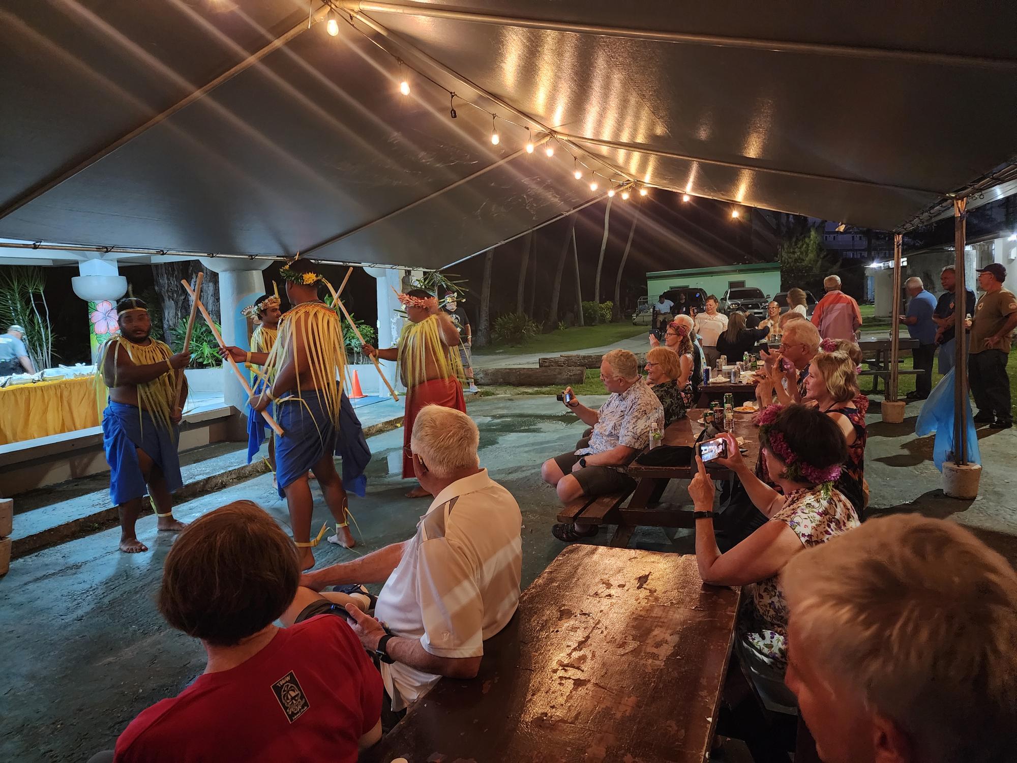 Carolinian cultural dancers perform during a dinner reception for visiting World War 2 veterans and their families on March 29, 2023, at the Carolinian Affairs Office pavilion.