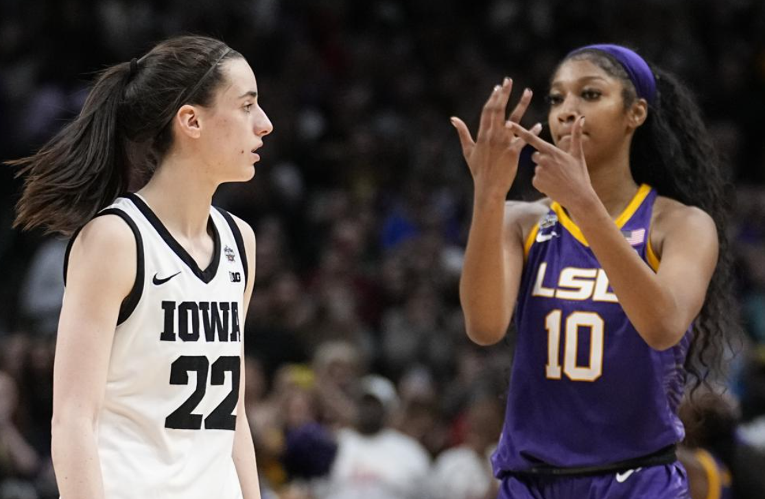 LSU's Angel Reese reacts in front of Iowa's Caitlin Clark during the second half of the NCAA Women's Final Four championship basketball game Sunday, April 2, 2023, in Dallas. LSU won 102-85 to win the championship.