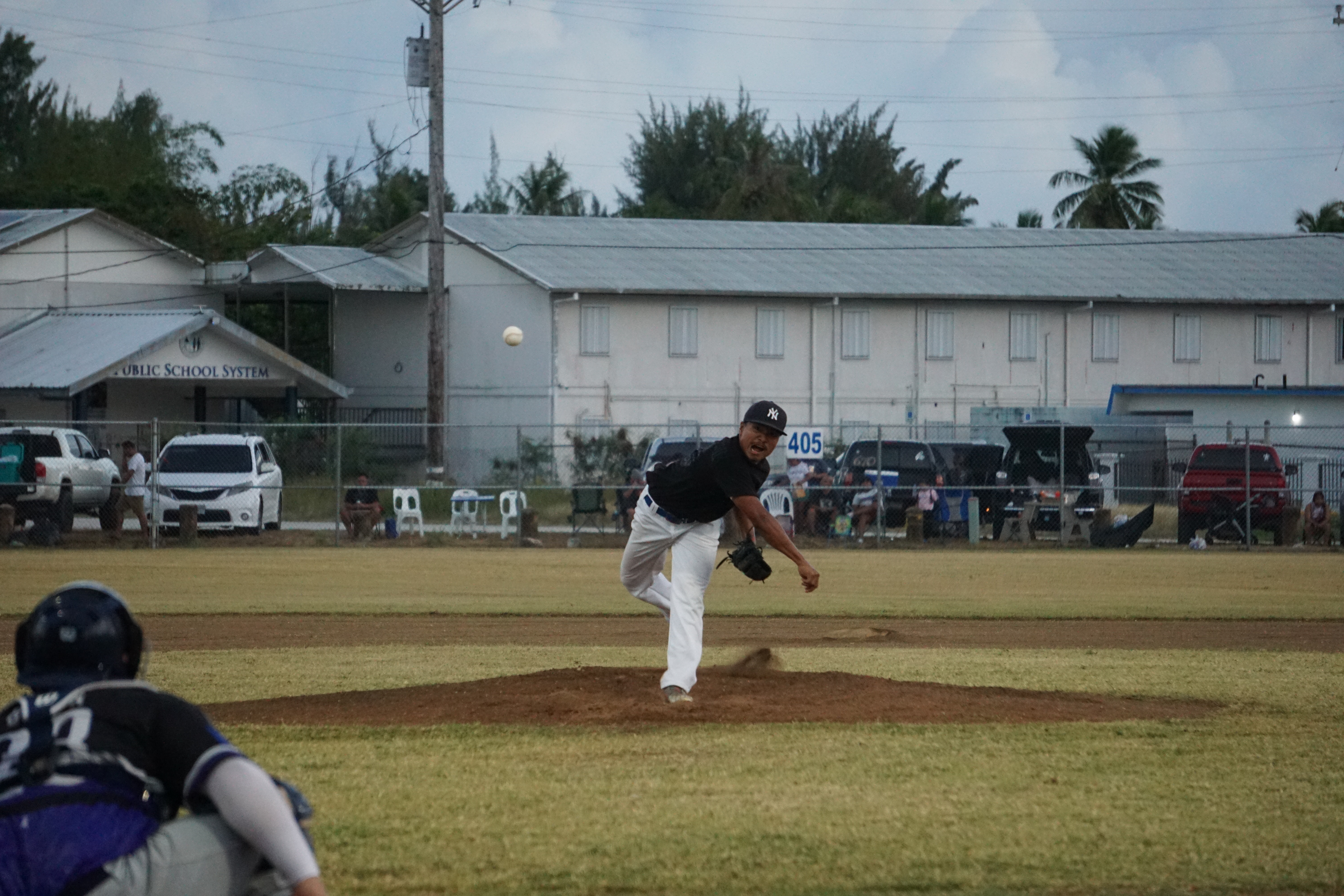 The Falcons' RJ Riungel pitches against the SPC Survivors  during a Tan Holdings Saipan Baseball League game at the Francisco "Tan Ko" Palacios Baseball Field.