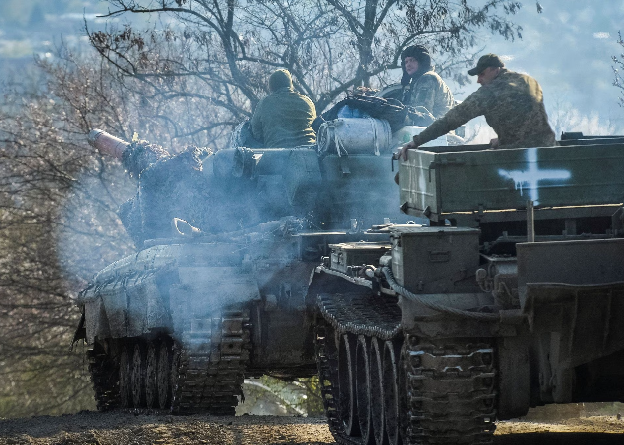 Ukrainian service members ride tanks, as Russia's attack on Ukraine continues, near the front line city of Chasiv Yar, Ukraine, April 10, 2023.