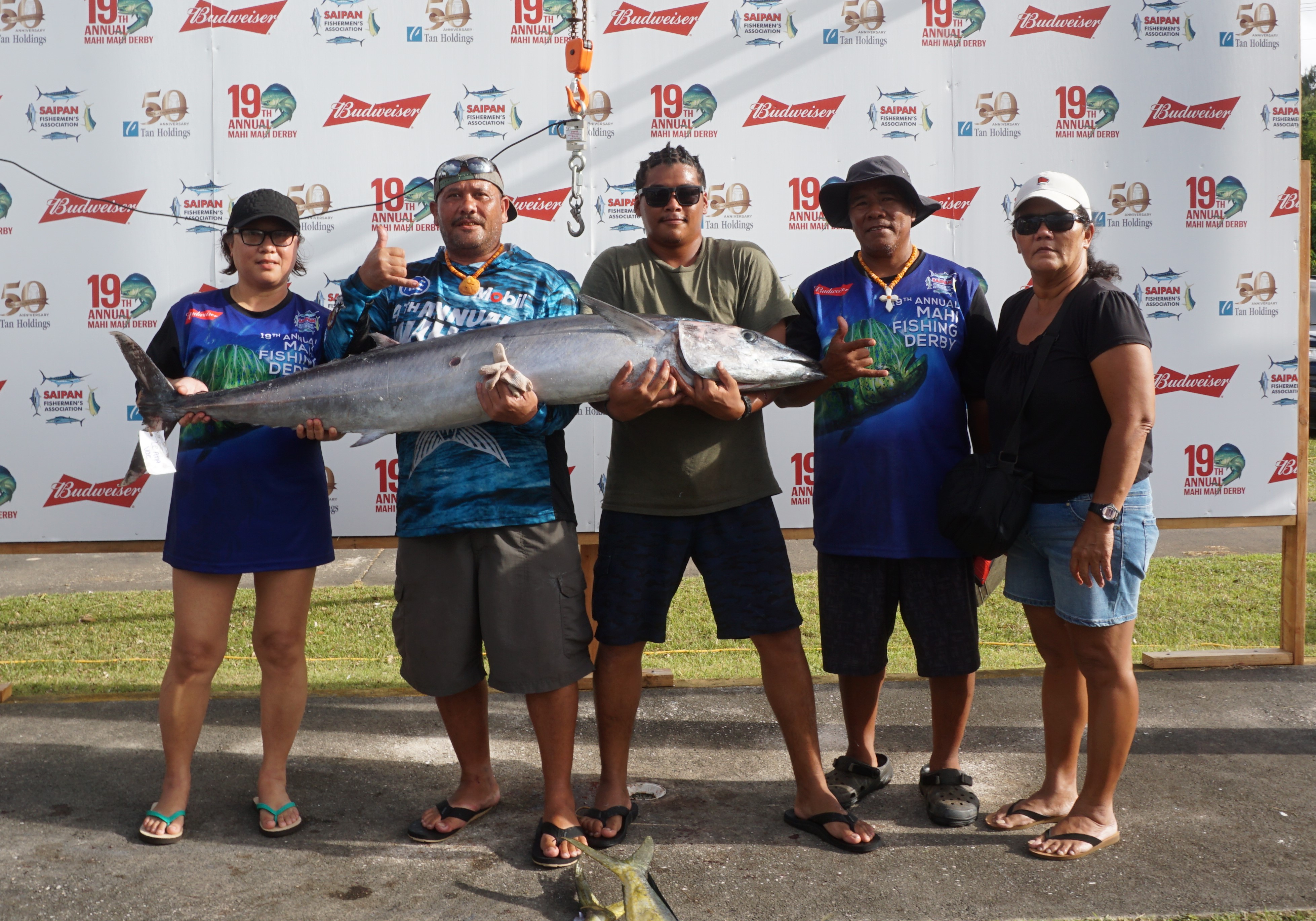 The crewmembers of Le’Ana Vae pose for a photo with their record-breaking 70.5lbs wahoo which won a $2,200 side bet of in the Saipan Fisherman’s Association 19th Annual Mahi Fishing Derby at  Smiling Cove Marina on Saturday.