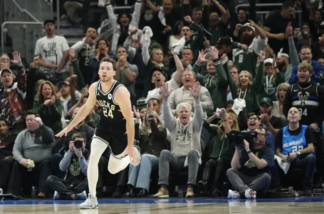 Milwaukee Bucks' Pat Connaughton reacts after making a shot during the first half of Game 2 of an NBA basketball first-round playoff series against the Miami Heat Wednesday, April 19, 2023, in Milwaukee.