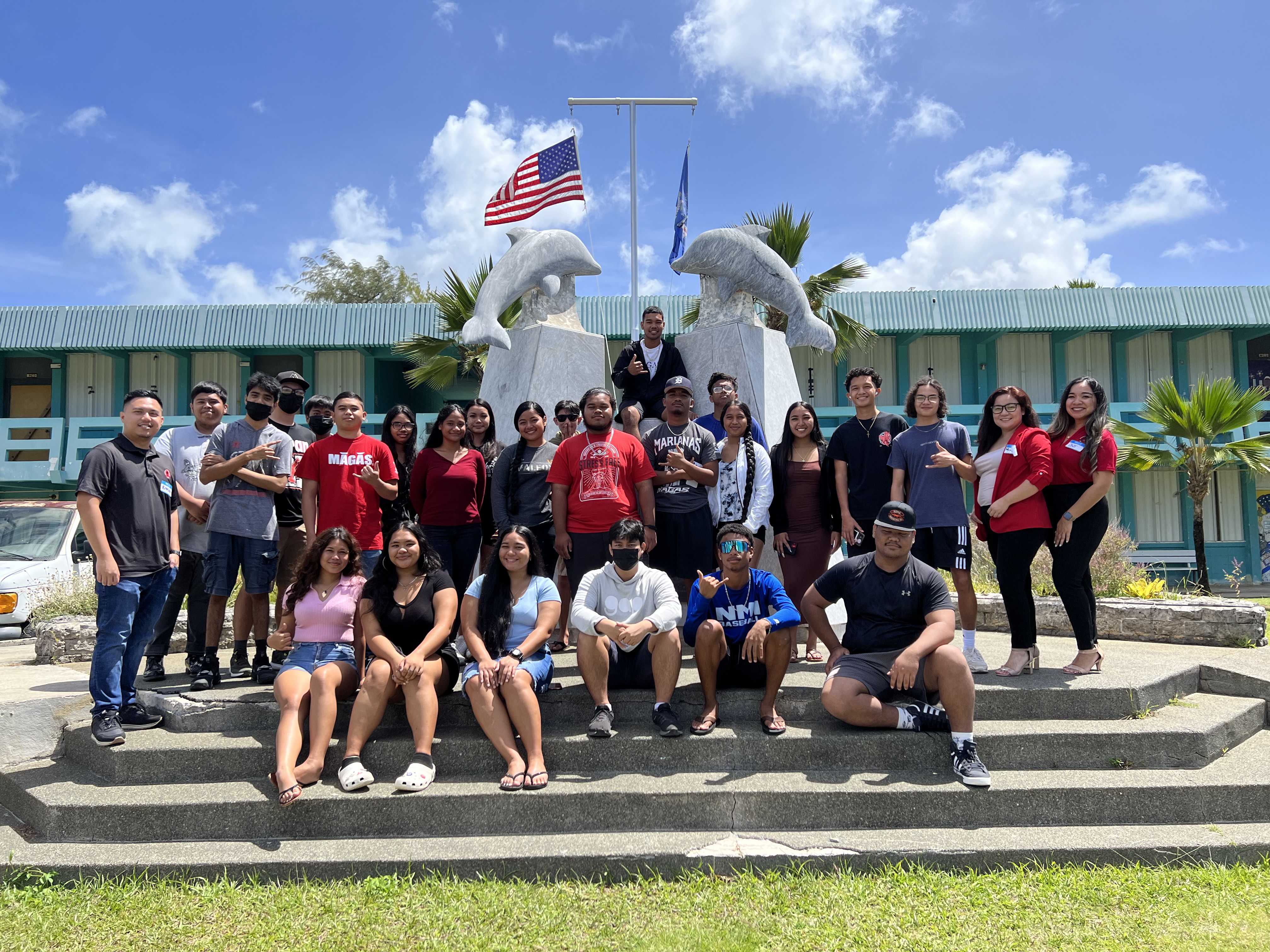 NMI SBDCN team members Mercilynn K. Palec, Roman Tudela, and Charmaine Hofschneider with Marianas High School students.