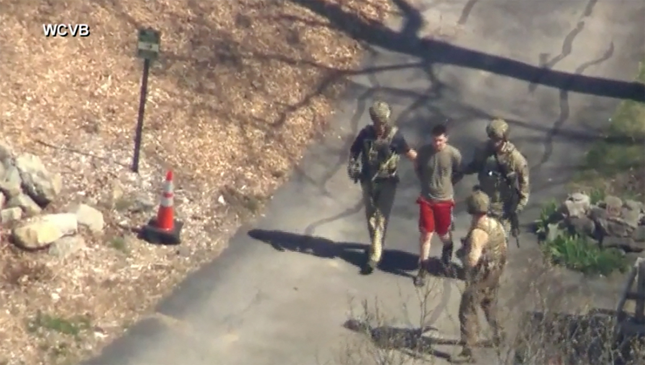 FBI agents arrest Jack Teixeira, an employee of the U.S. Air Force National Guard, in connection with an investigation into the leaks online of classified U.S. documents, outside a residence in this still image taken from video in North Dighton, Massachusetts, U.S., April 13, 2023. WCVB-TV via ABC via REUTERS