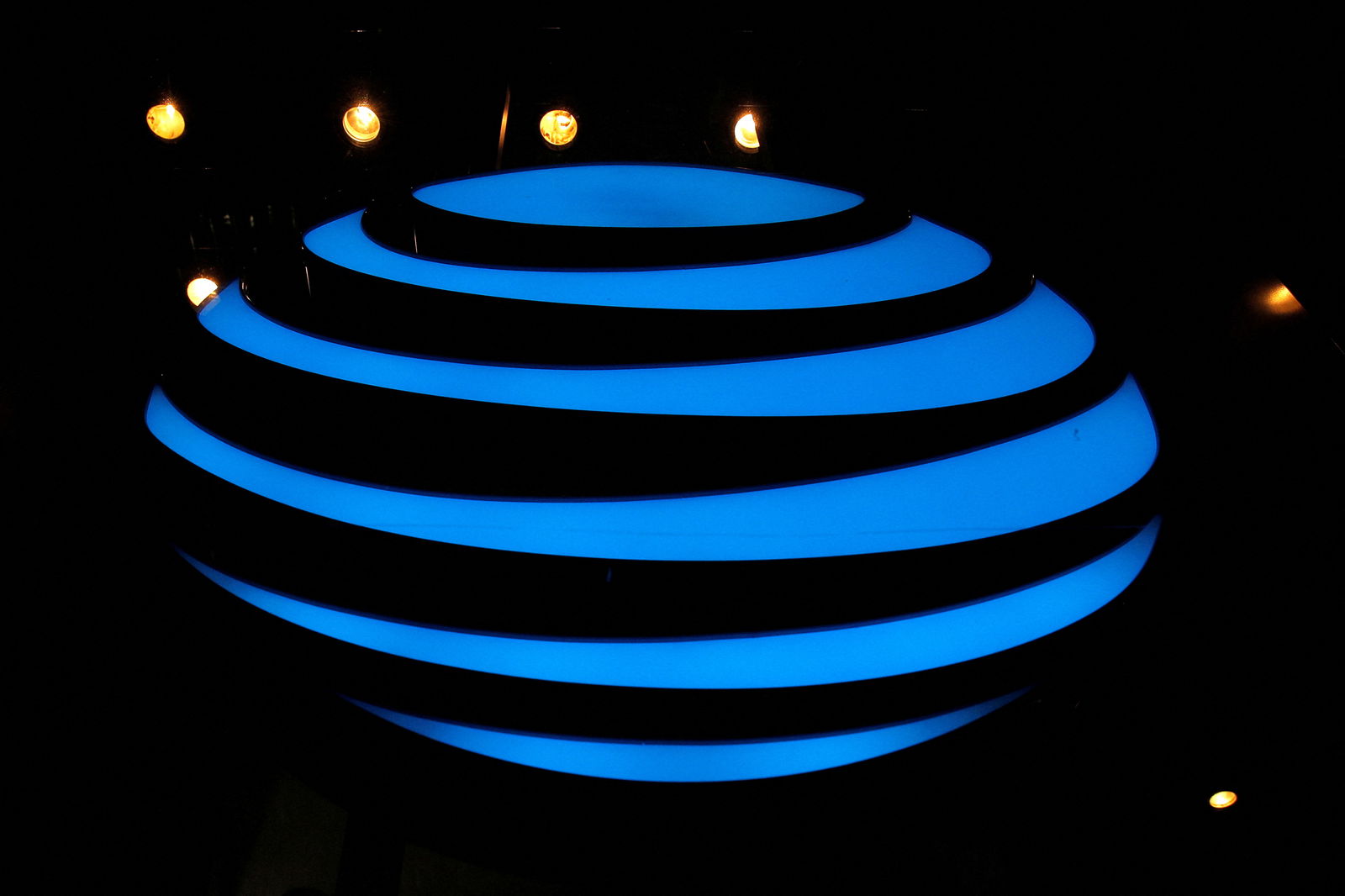 FILE PHOTO: The AT&T logo is seen in a store window in the Manhattan borough of New York City, New York, U.S., January 19, 2022. REUTERS/Brendan McDermid
