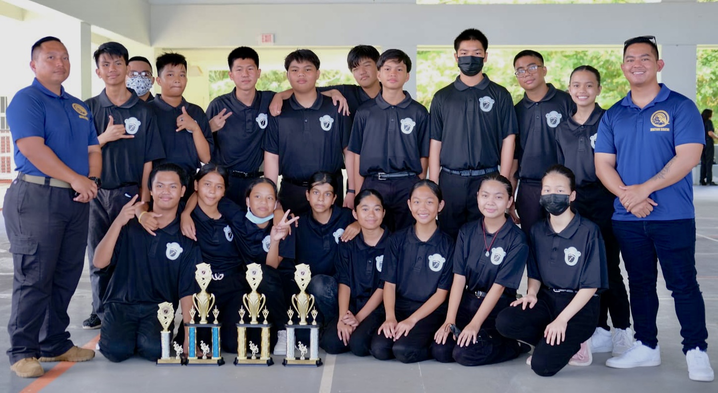 The Hopwood Middle School Leadership Corps team with their instructors: Michael Berbes, Jonathan Sugatan and Donovan Pangelinan.