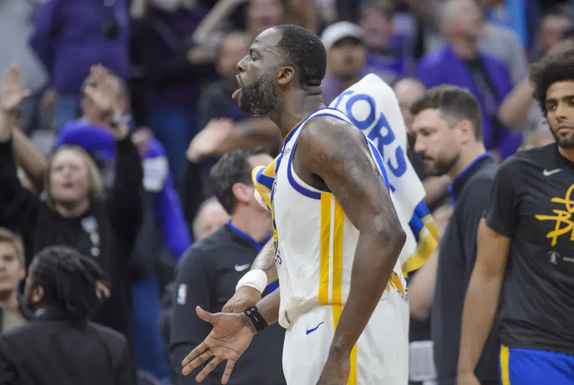 Golden State Warriors forward Draymond Green shouts at the crowd as he is ejected from the game during the second half of Game 2 in the first round of the NBA basketball playoffs against the Sacramento Kings in Sacramento, Calif., Monday, April 17, 2023. The Kings won 114-106.
