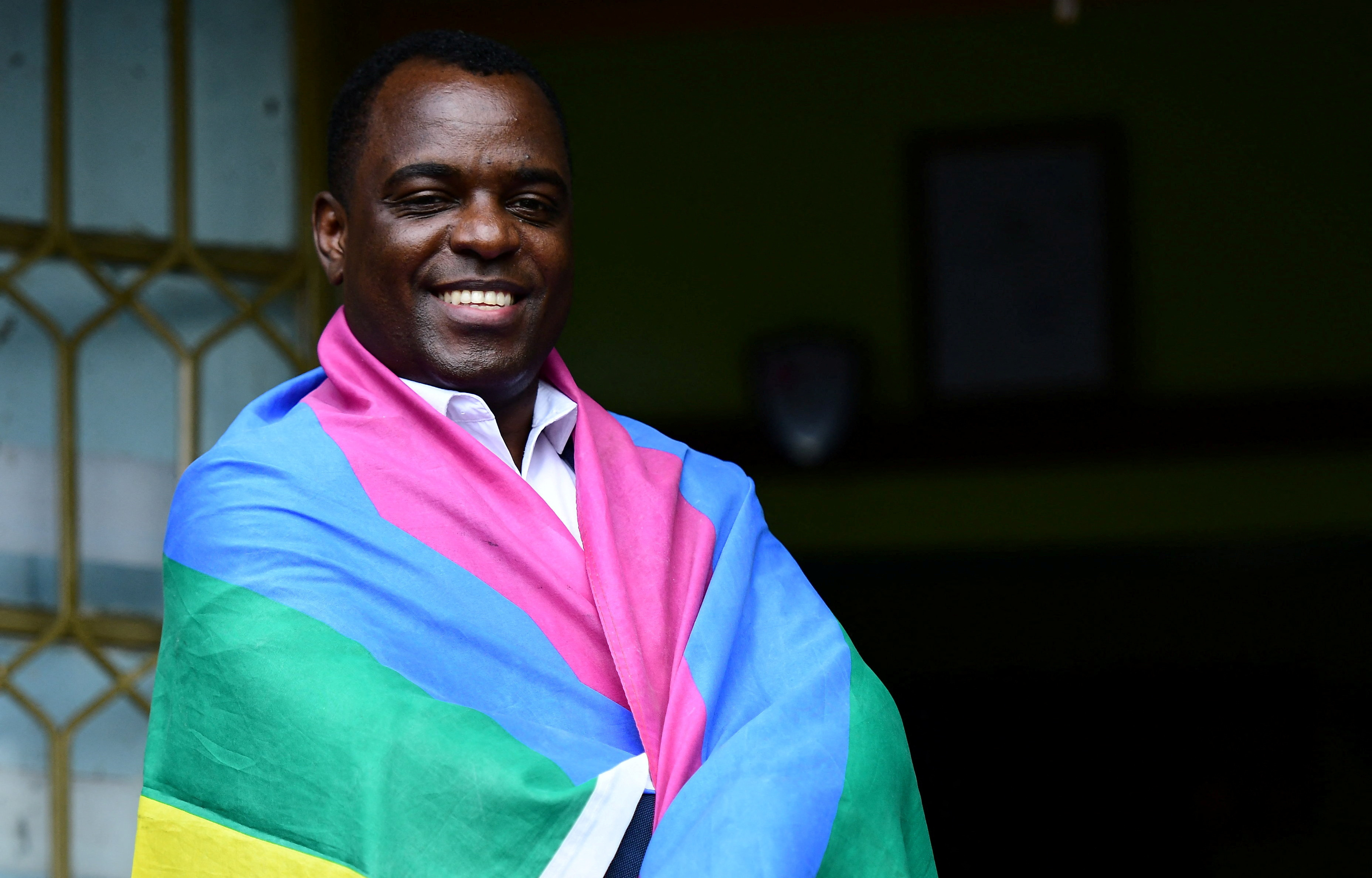 Ugandan LGBTQ activist Frank Mugisha poses for a photograph after a Reuters interview in Makindye, suburb, of Kampala, Uganda March 30, 2023. REUTERS/Abubaker Lubowa