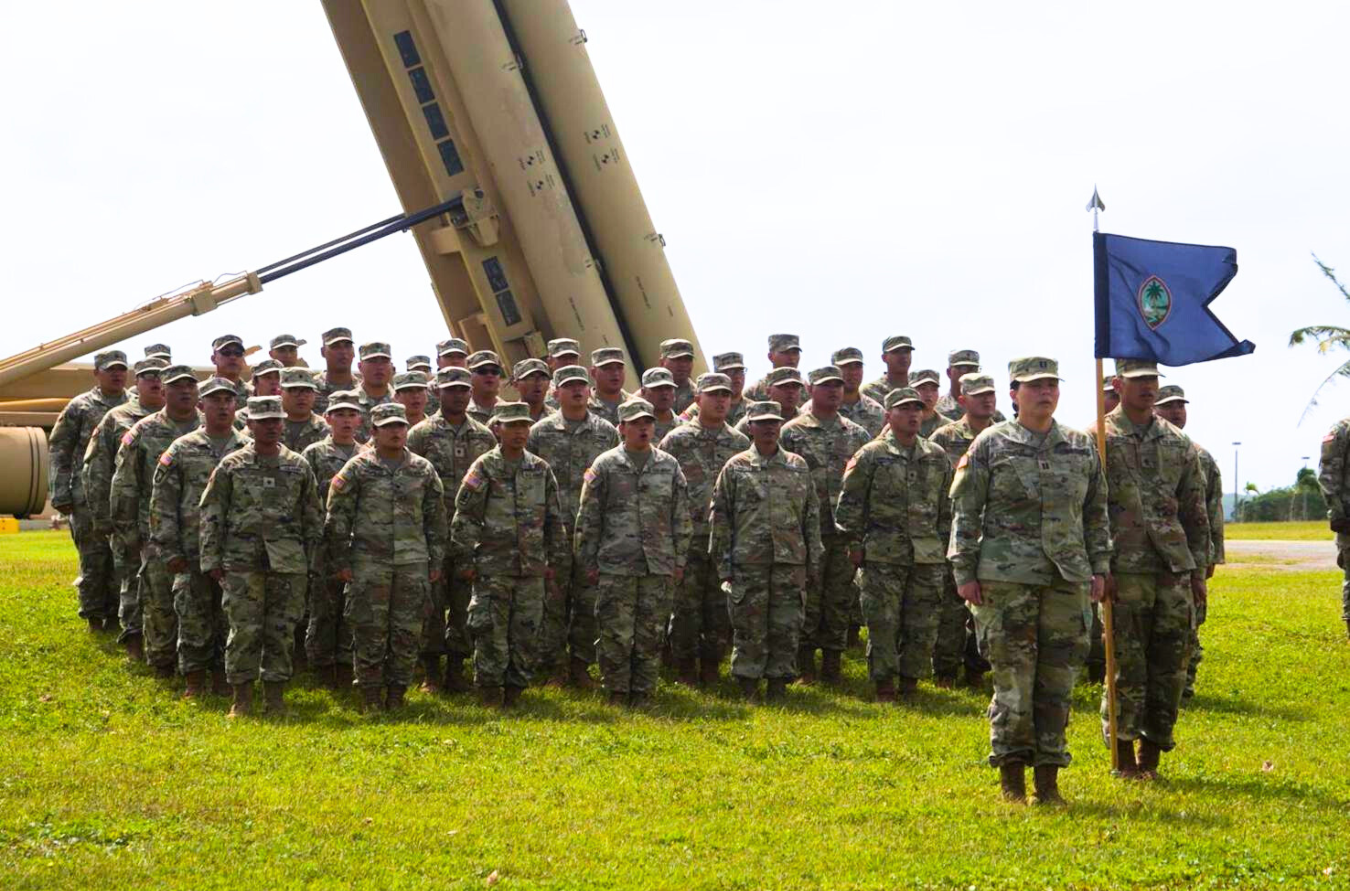 Guam Army National Guard soldiers stand in front of a Terminal High Altitude Area Defense system Feb. 7, 2023, at the Arc Light Park on Andersen Air Force Base.  