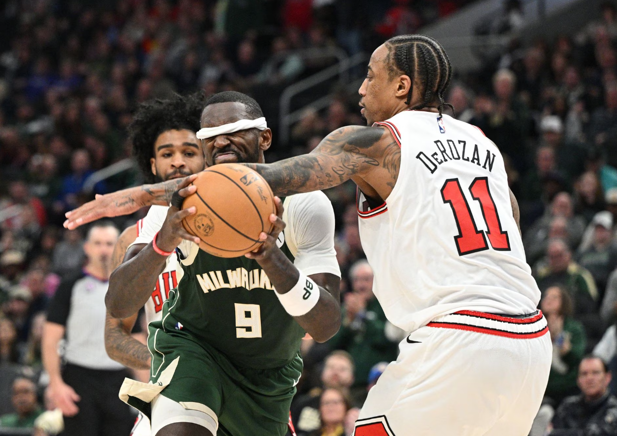Milwaukee Bucks forward Bobby Portis (9) drives to the basket against Chicago Bulls forward DeMar DeRozan (11) in the second half at Fiserv Forum in Milwaukee, Wisconsin, April 5, 2023.