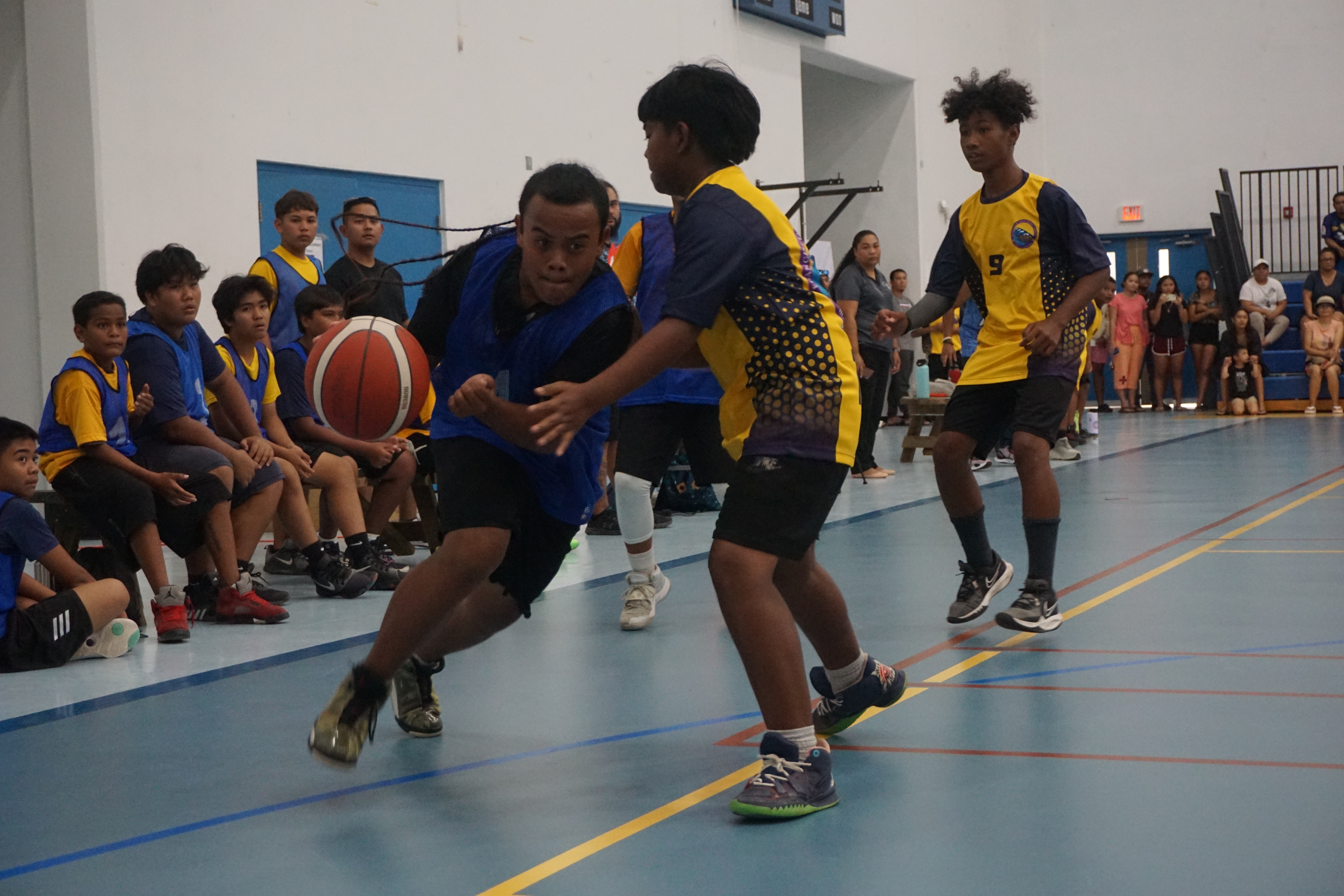 HMS JV's Tyrese Monkeya drives past a defender during a boys middle school division game of the IT&E Interscholastic Basketball League Wednesday at the MHS gym.