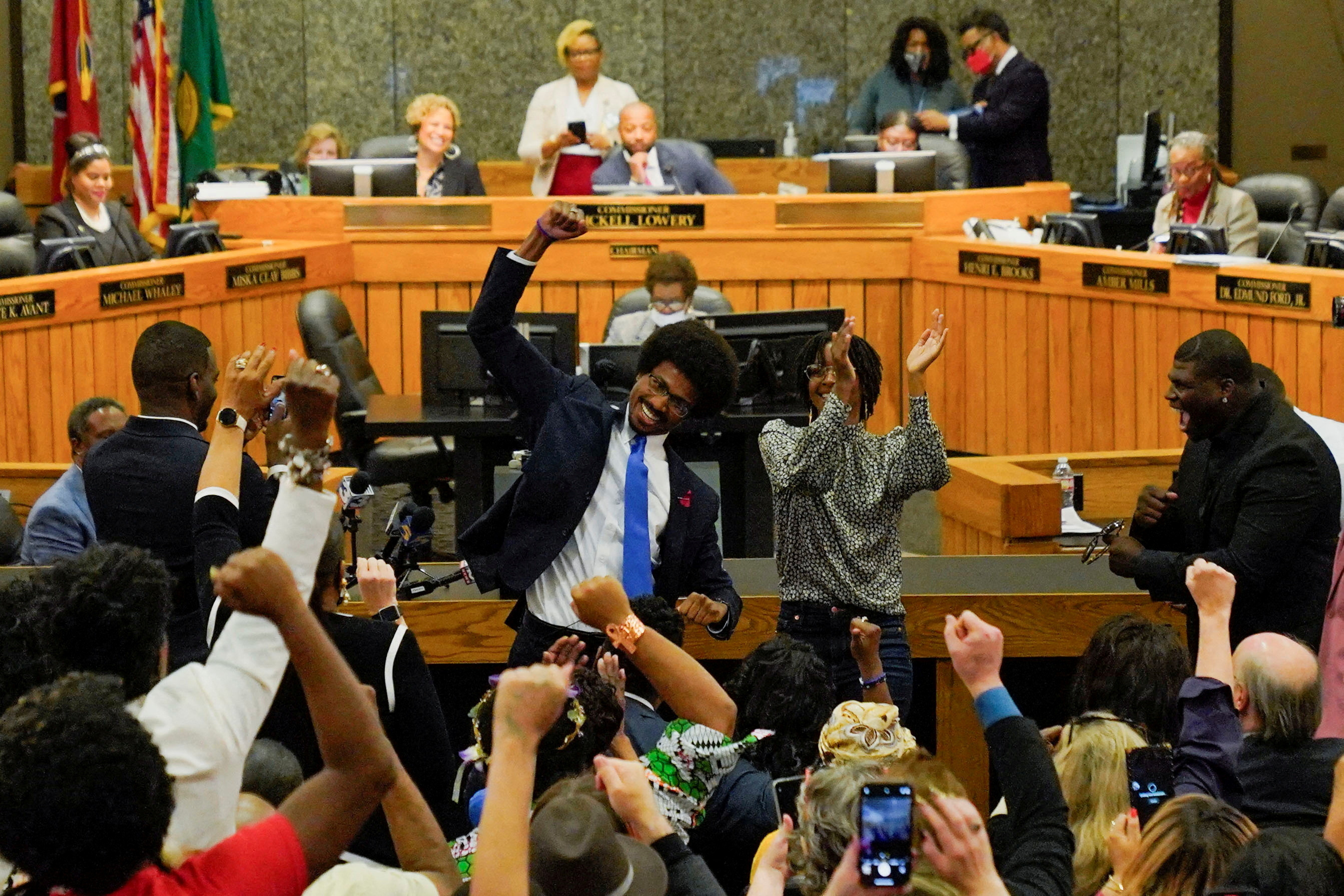 Justin J. Pearson gestures after a vote for his reinstatement by the Shelby County Commission, days after the Republican majority Tennessee House of Representatives voted to expel him and Rep. Justin Jones for their roles in a gun control demonstration on the statehouse floor, in Memphis, Tennessee, U.S., April 12, 2023. REUTERS/Cheney Orr
