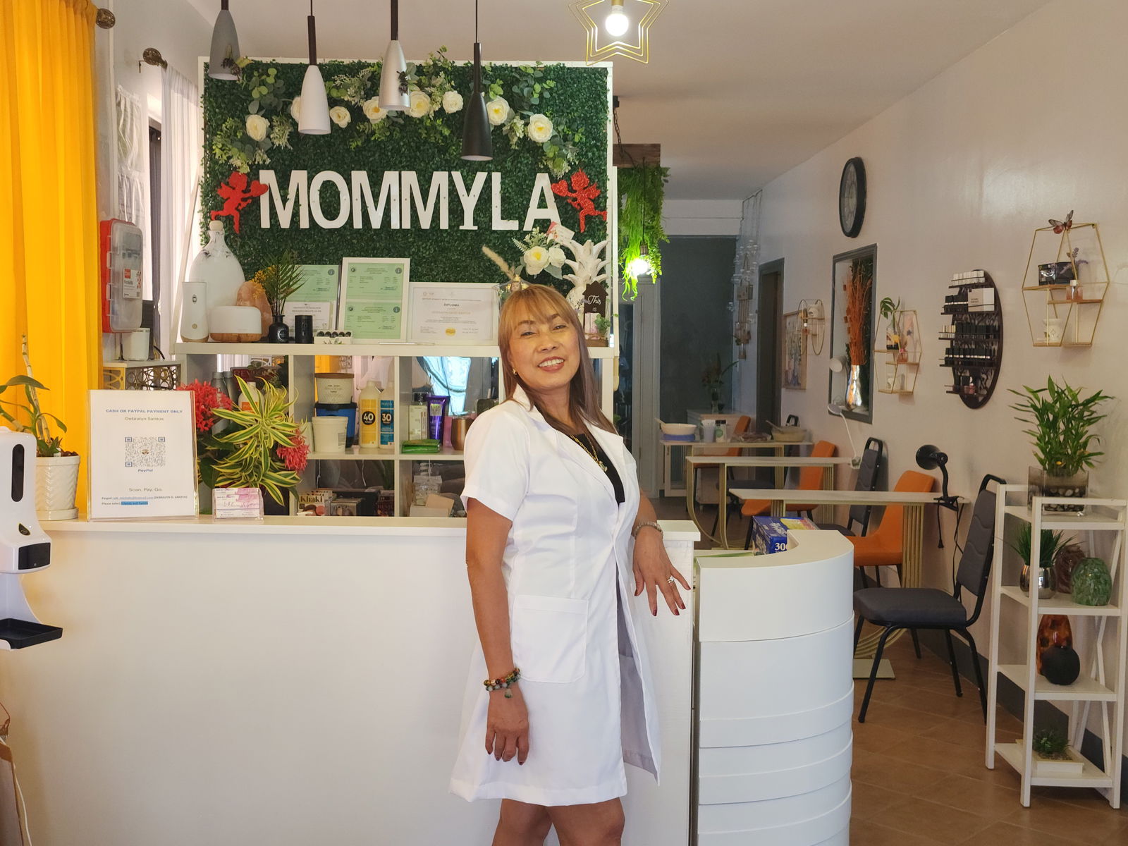 Marlyn “Mommyla” Dougtery  is the president and proprietress of Mommyla's Hair and Beauty Salon.