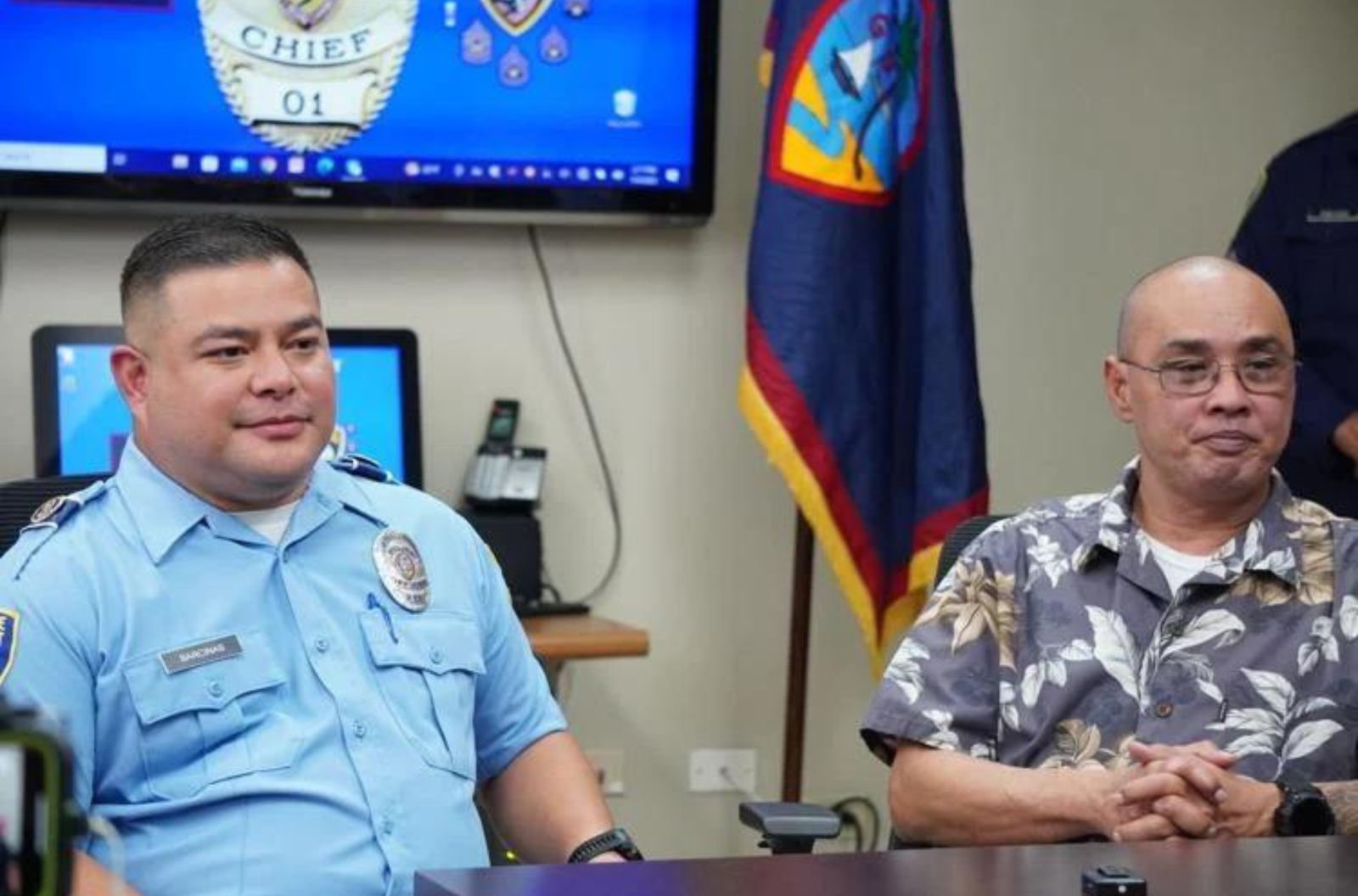 Eric Barcinas, left, officer of the year; and Louie Perez, civilian police reservist of the year, are pictured Thursday, May 4, 2023, at Guam Police Department headquarters in Tiyan. 