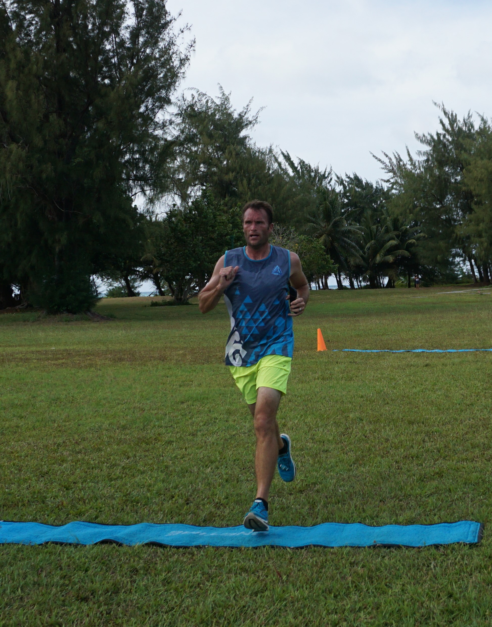 Chad Taflinger finishes first in the men's division of the SIS & Run Saipan’s 3rd Annual Star Wars Day run Saturday at Micro Beach.