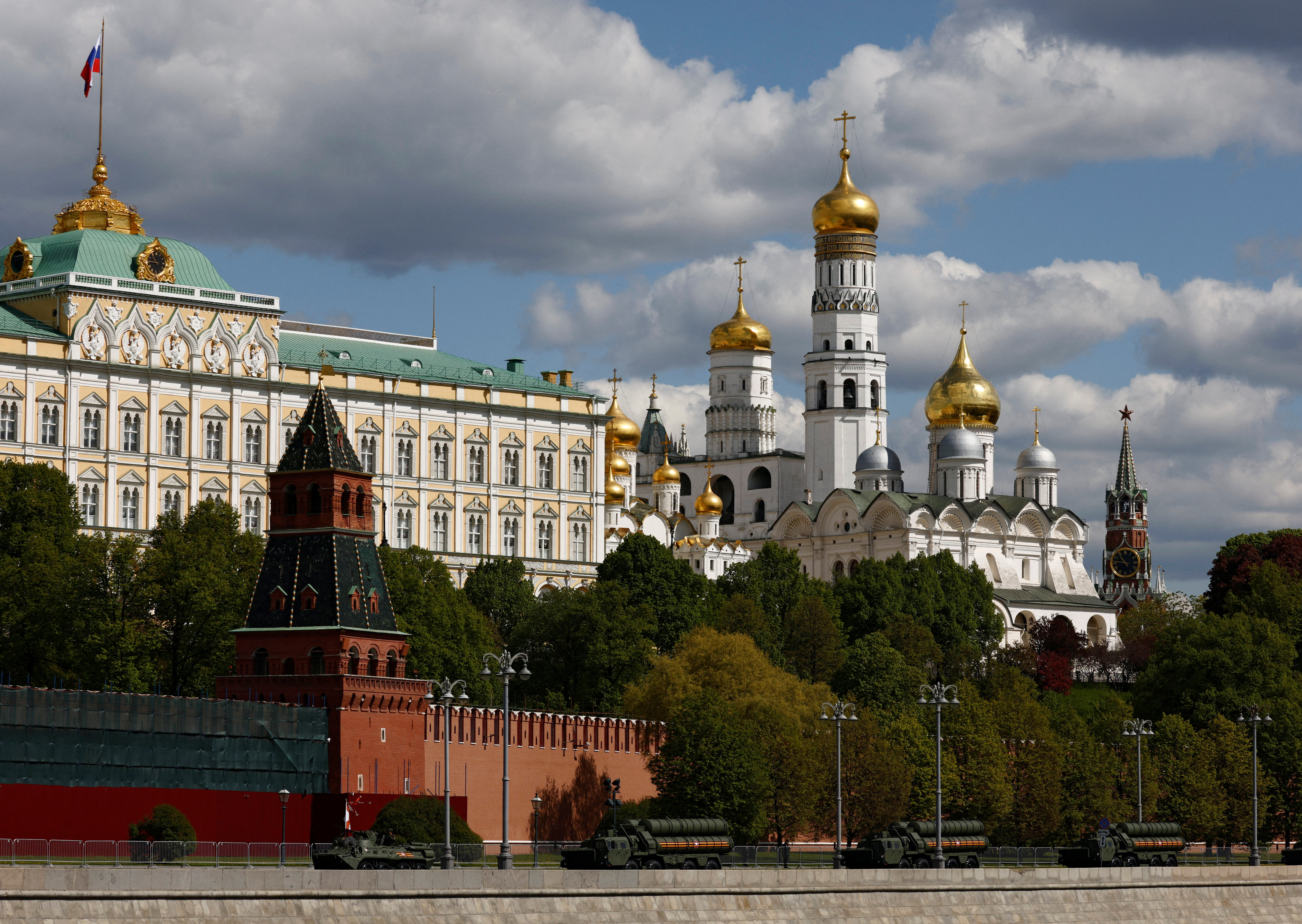 A Russian armoured personnel carrier and S-400 surface-to-air missile systems drive past the Kremlin wall after a military parade on Victory Day, which marks the 78th anniversary of the victory over Nazi Germany in World War Two, in Moscow, Russia May 9, 2023. REUTERS/Maxim Shemetov/File Photo