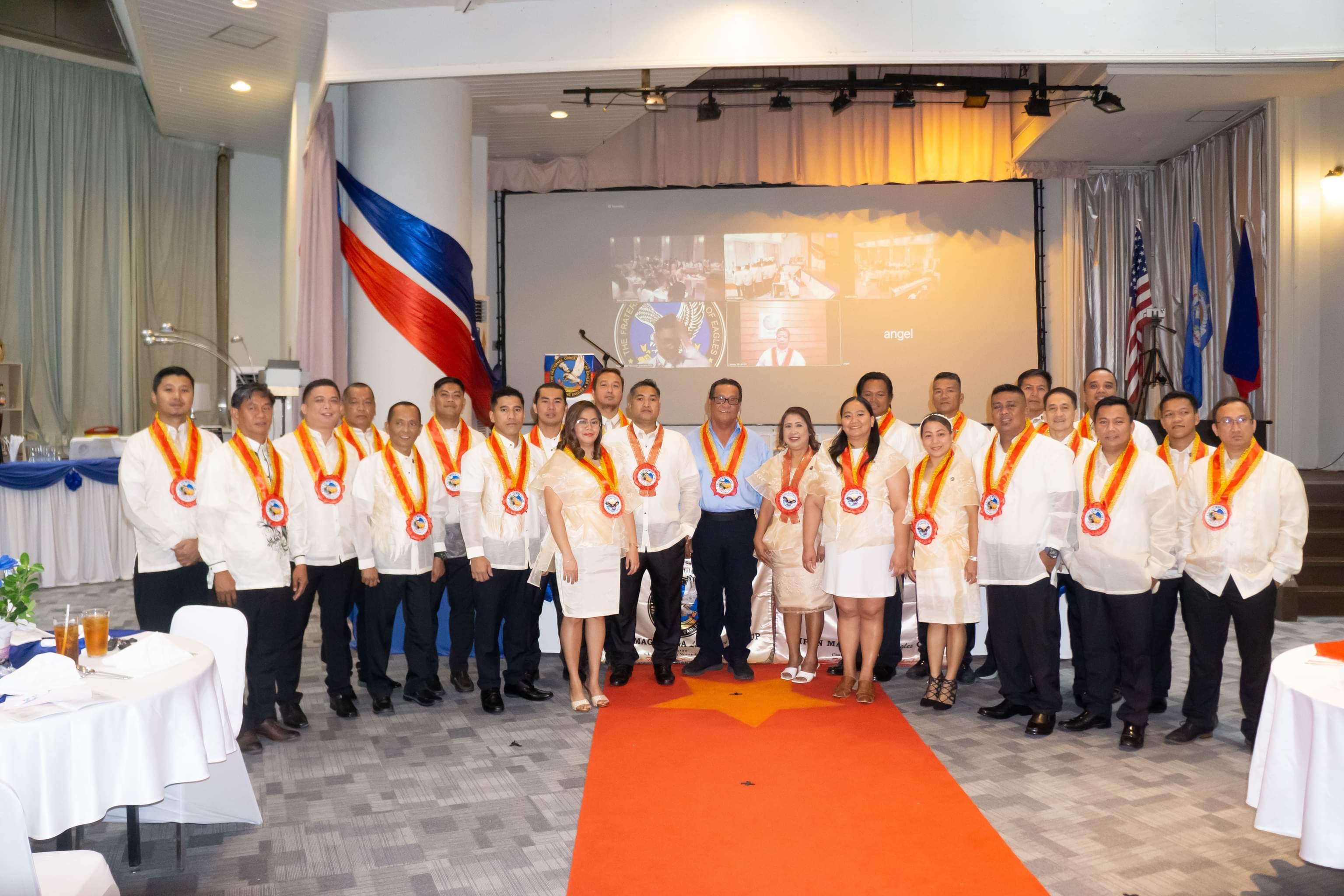 The newly inducted members of the Saipan Maga'lahi Eagles Club  and the Saipan Maga'Haga Lady Eagles Group with Saipan Mayor Ramon "RB" Camacho.