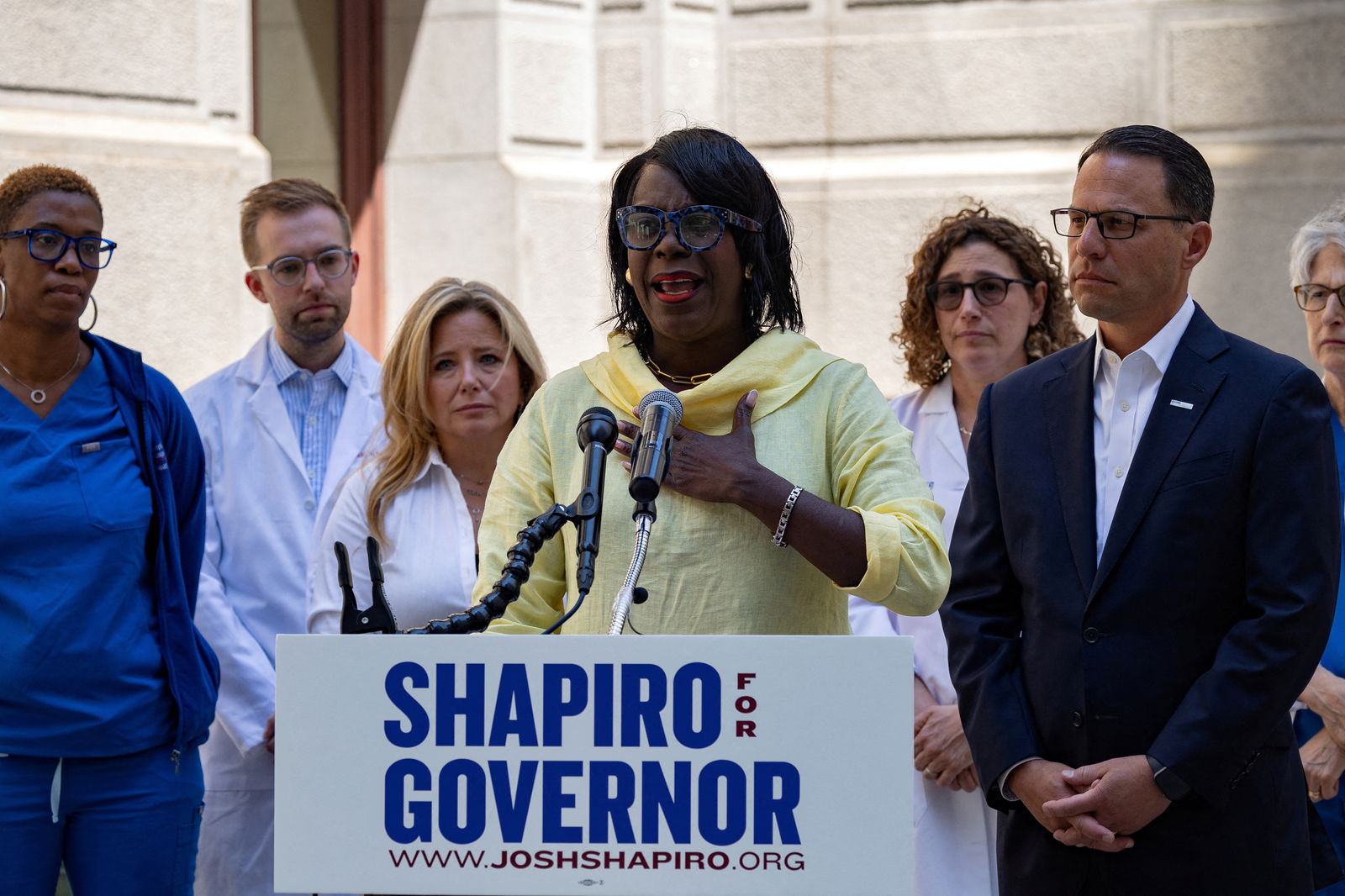 FILE PHOTO: Philadelphia City Council Majority Leader Cherelle Parker speaks about protecting abortion access, as Pennsylvania Attorney General and candidate for governor Josh Shapiro listens during a news conference in Philadelphia, Pennsylvania, U.S., June 29, 2022. REUTERS/Hannah Beier