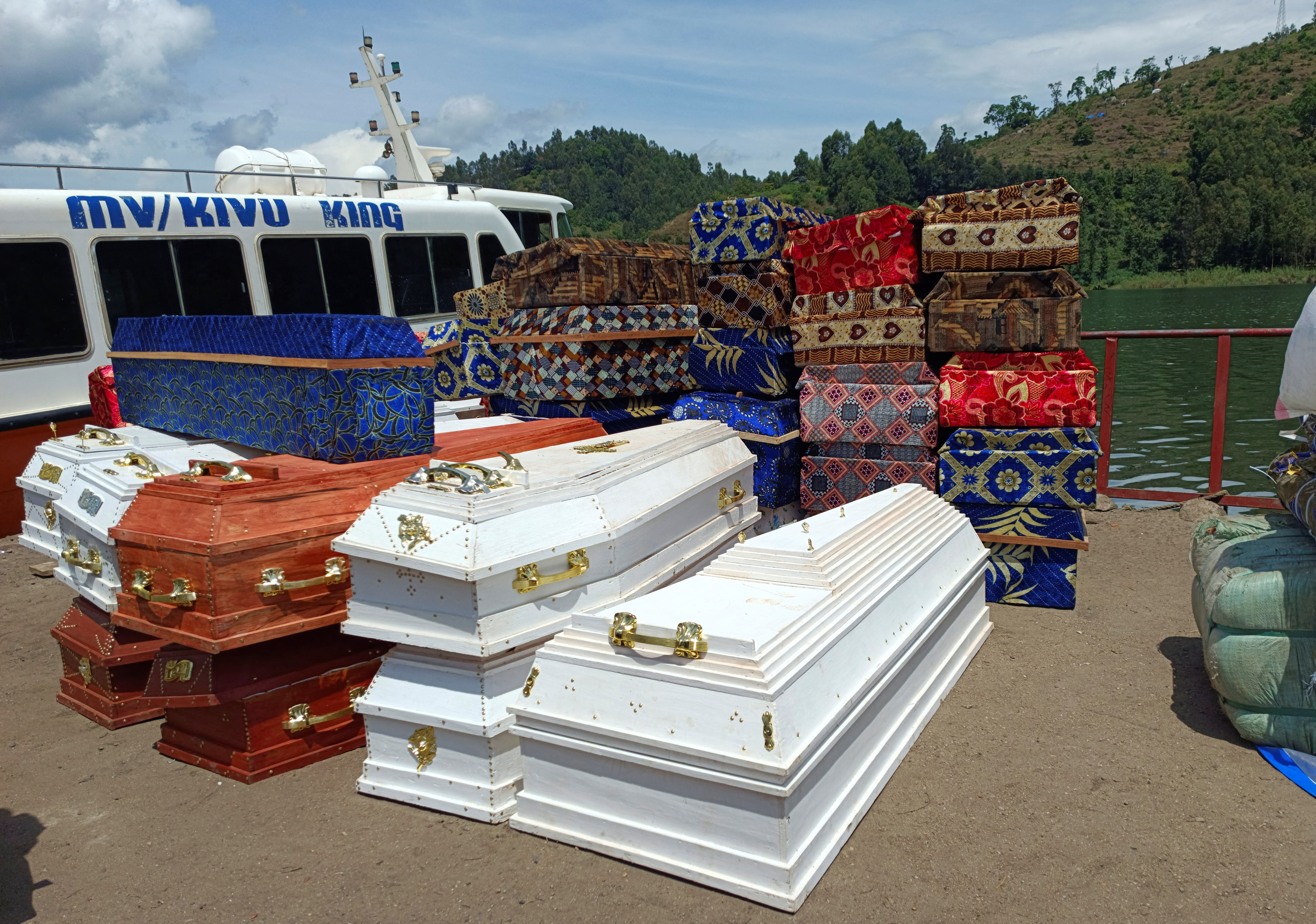 A view shows coffins for the Congolese civilians killed following rains that destroyed the remote, mountainous area and ripped through the riverside villages of Nyamukubi, Kalehe territory in South Kivu province of the Democratic Republic of Congo May 9, 2023. REUTERS/Djaffar Sabiti