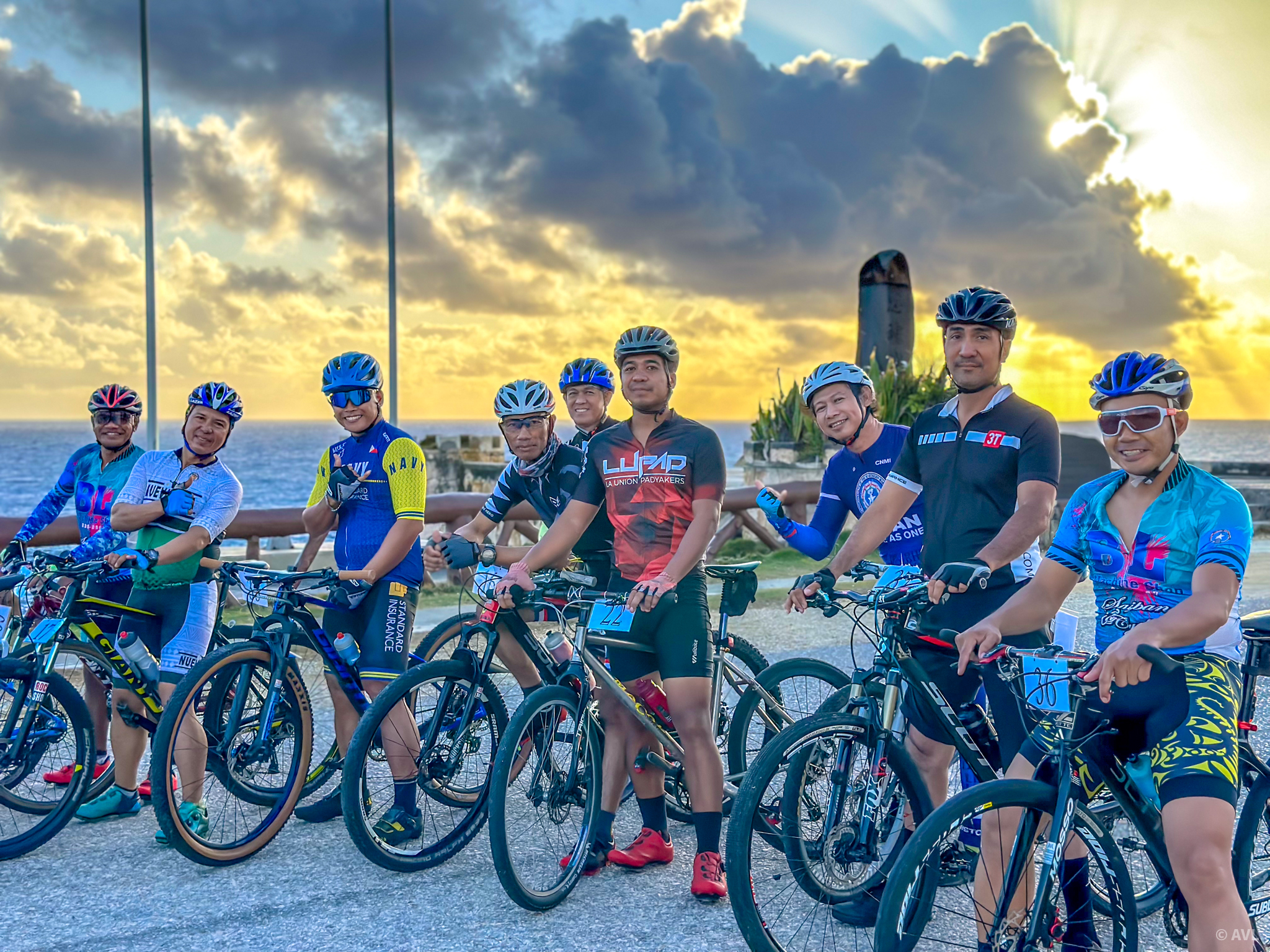 Mountain bikers pose for a photo prior to the start of the race.