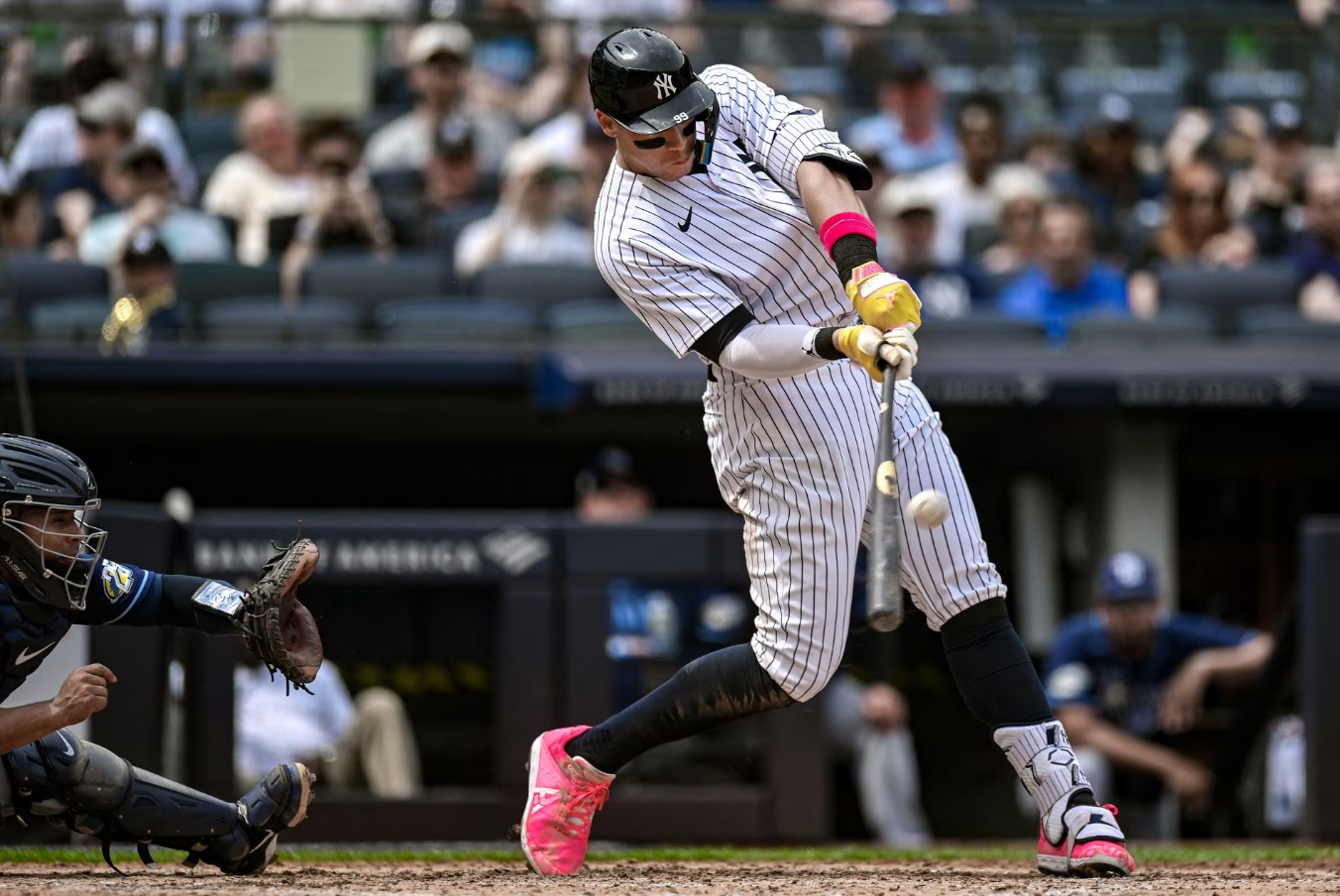 New York Yankees center fielder Aaron Judge (99) hits a two-run home run against the Tampa Bay Rays during the fifth inning at Yankee Stadium, the Bronx, New York, May 13, 2023.