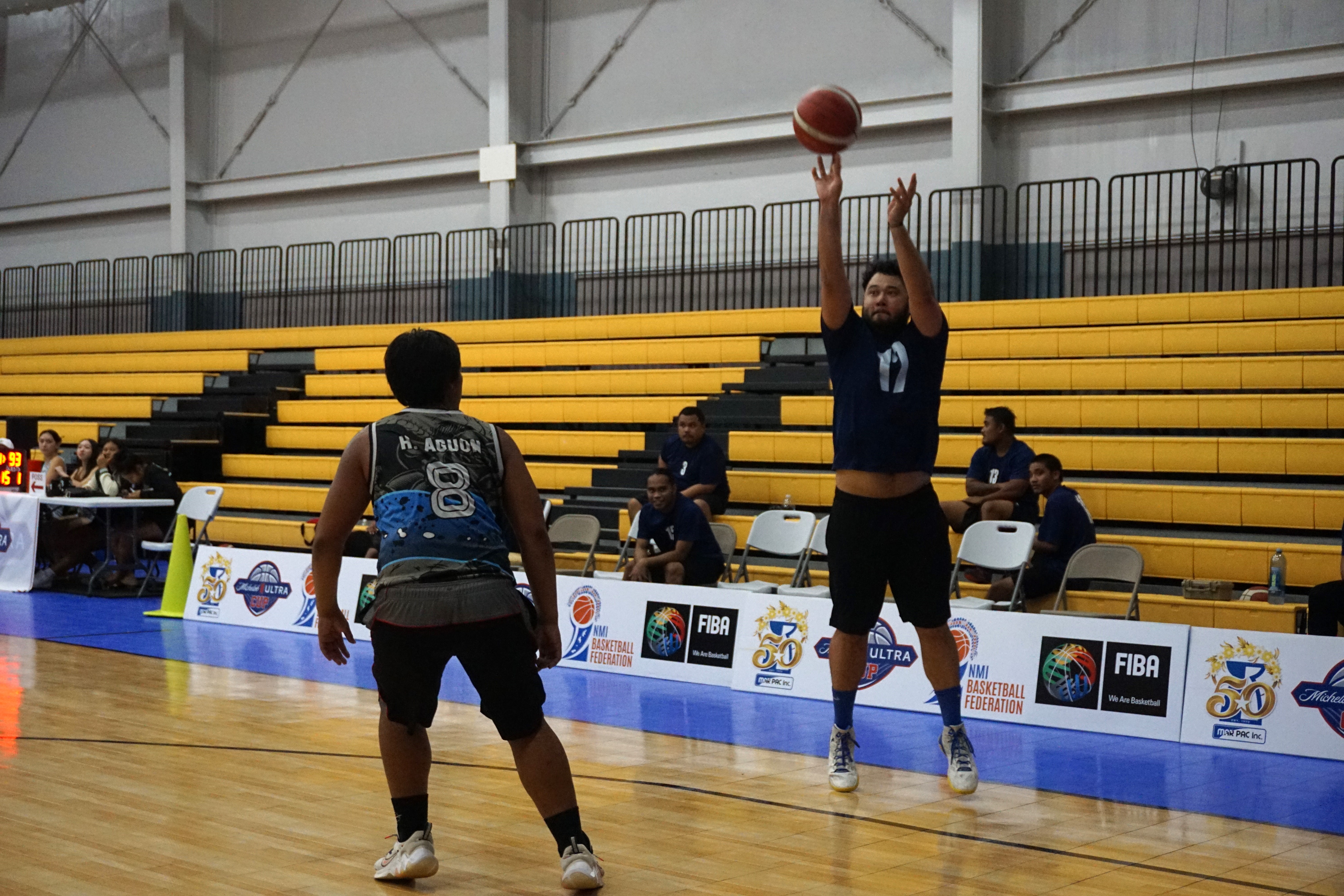 Martech Ol'Aces' Riley Brungard takes the uncontested three-point shot during a playoff game of the Michelob Ultra Cup 2023 Tuesday at the Ada gym.