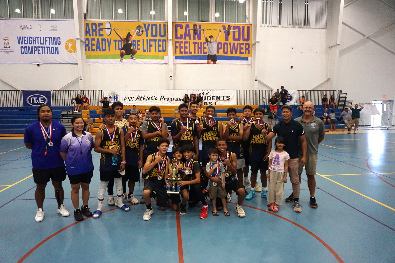 The FMS team members pose with the boys middle school division championship trophy of the IT&E-PSS Interscholastic Basketball League at the MHS gym on Saturday.