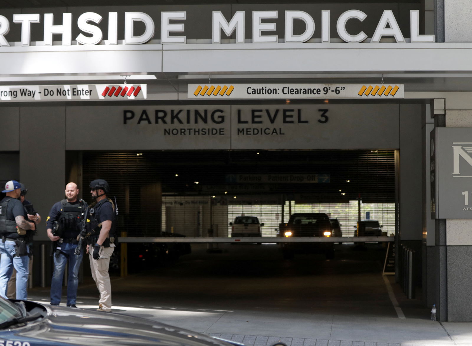 Law enforcement officers stand after reports of several casualties from a gunman in a downtown hospital in Atlanta, Georgia, U.S. May 3, 2023. REUTERS/Alyssa Pointer