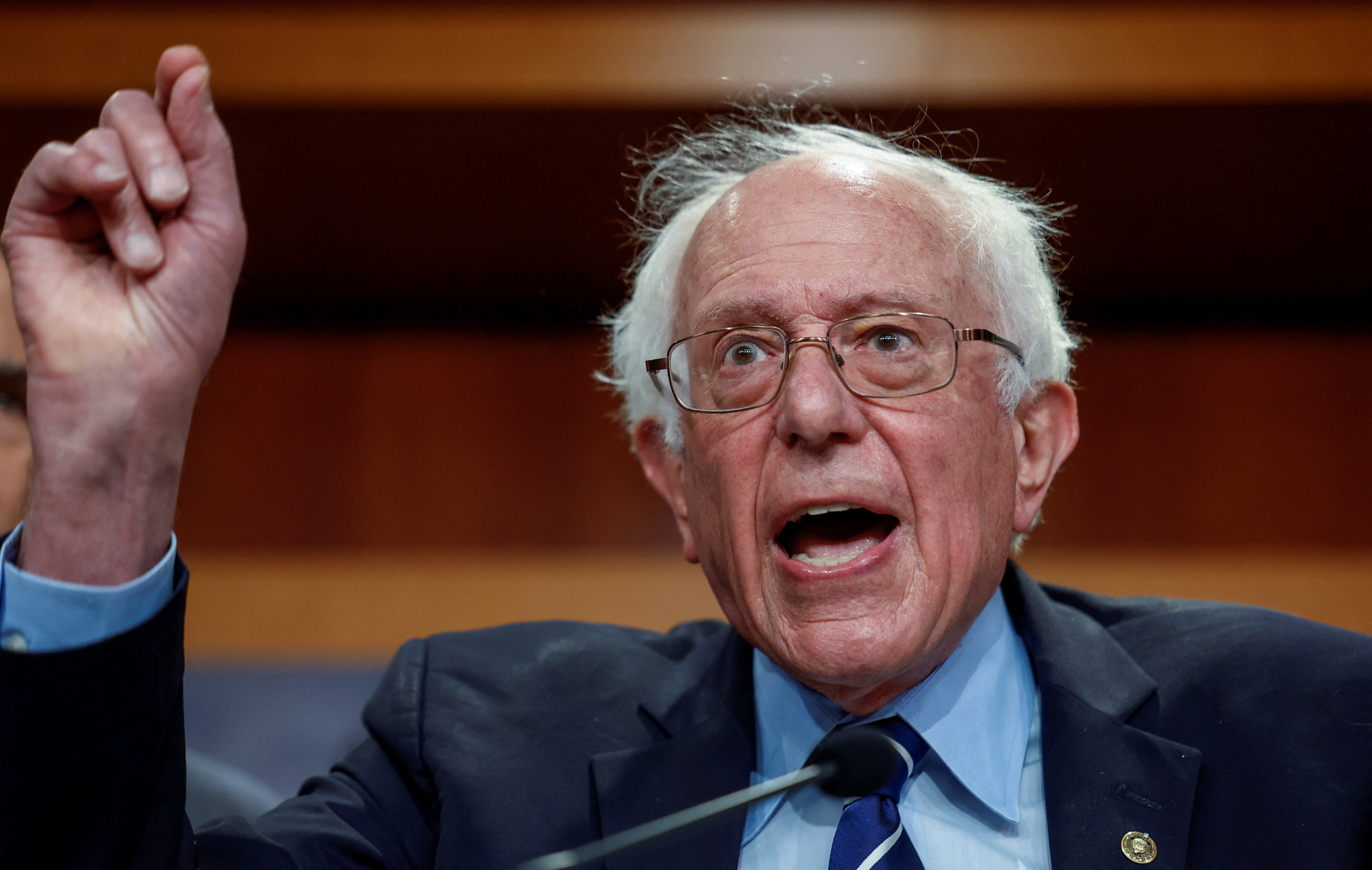 U.S. Senator Bernie Sanders (I-VT) speaks at a press conference on Capitol Hill about 11 Senate Democrats who sent a letter to President Joe Biden urging him to invoke the 14th Amendment to avoid a catastrophic debt default, in Washington, U.S., May 18, 2023. REUTERS/Evelyn Hockstein