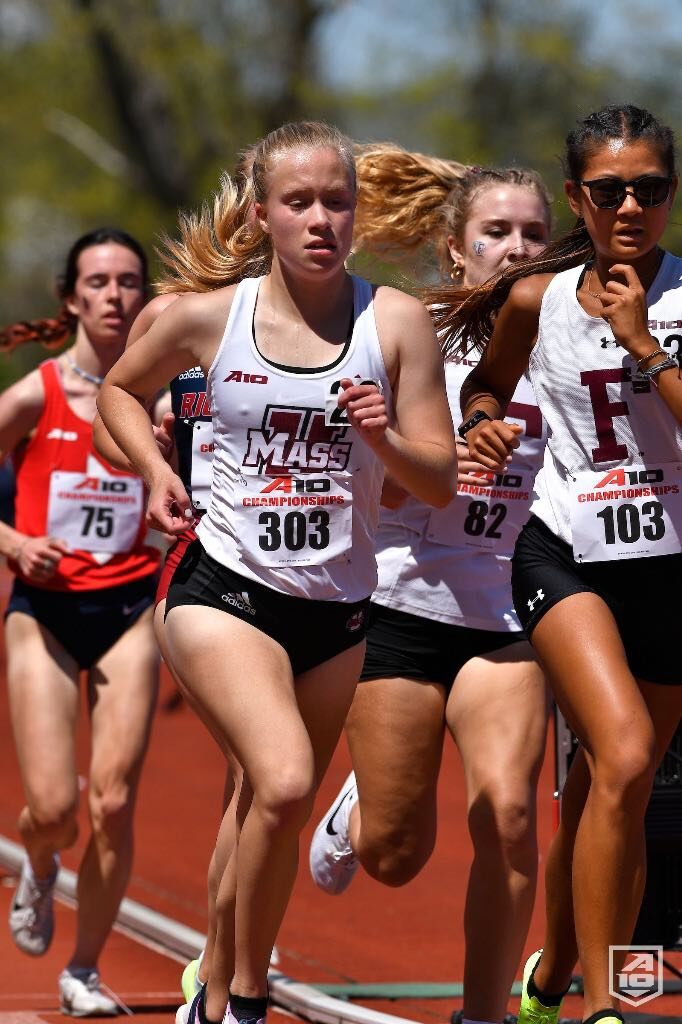 Tania Tan, right, races among other runners in the 10,000-meter event of the Atlantic 10 Outdoor Track & Field Championships at the University of Massachusetts over the weekend.