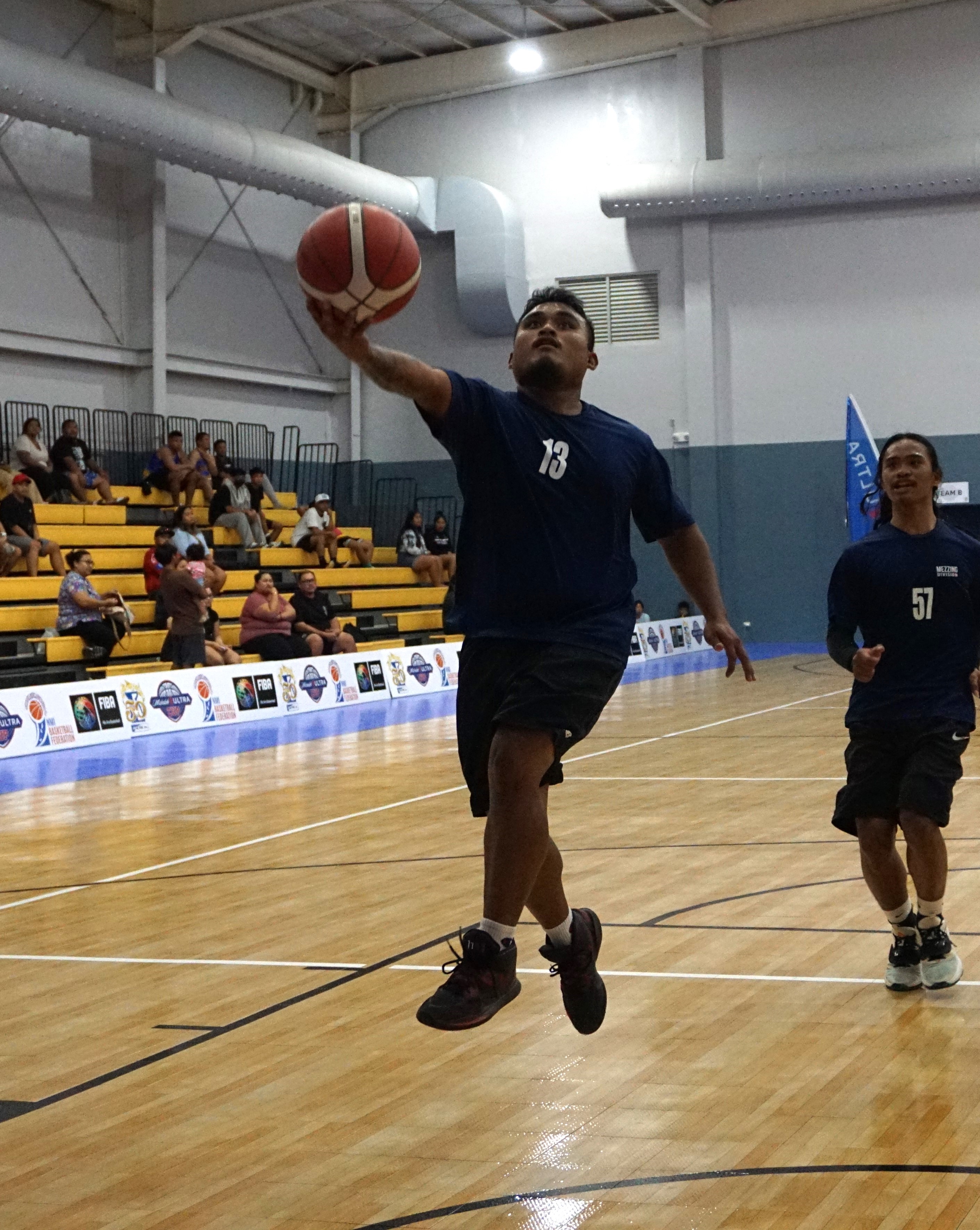 The Martech Ol'Aces' Brandy Onopwy extends for the open layup during a Michelob Ultra Cup game at the Ada gym.
