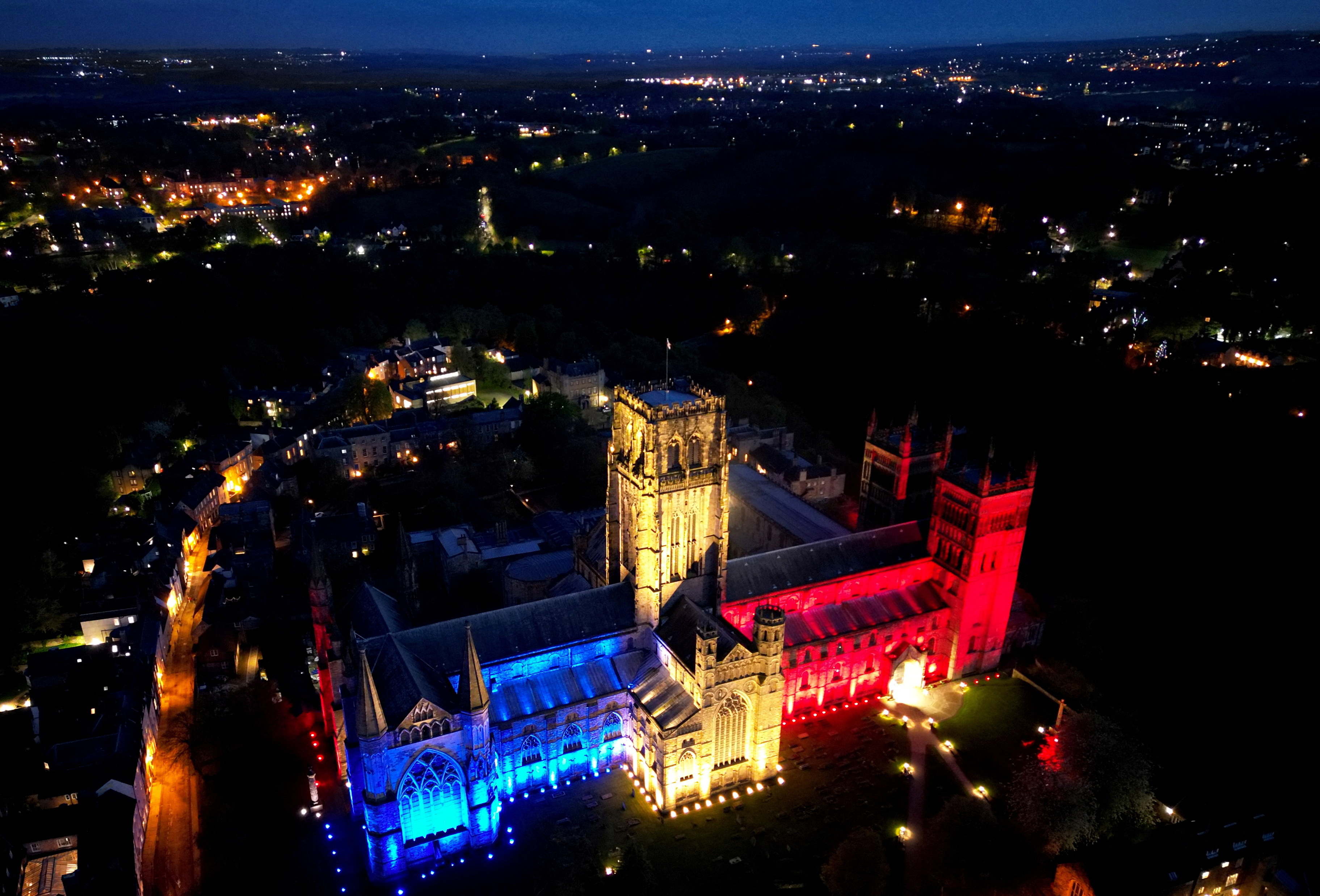 Durham Cathedral is lit up in the colours of the Union Jack ahead of coronation of King Charles in Durham, Britain, May 5, 2023.REUTERS/Lee Smith