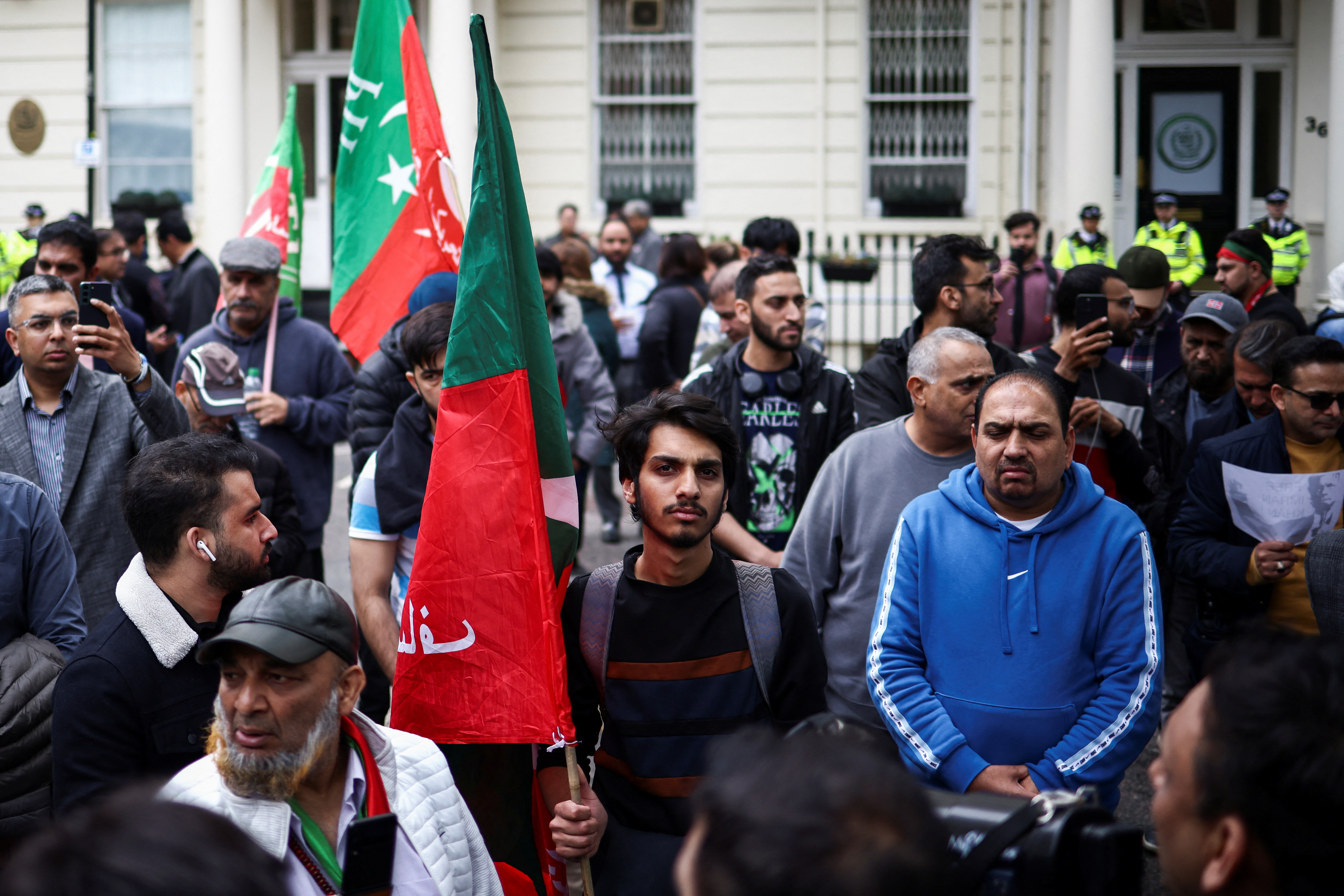 Supporters of Pakistan's former Prime Minister Imran Khan protest against his arrest in Pakistan, outside of the High Commission for Pakistan in London, Britain, May 9, 2023. REUTERS/Henry Nicholls