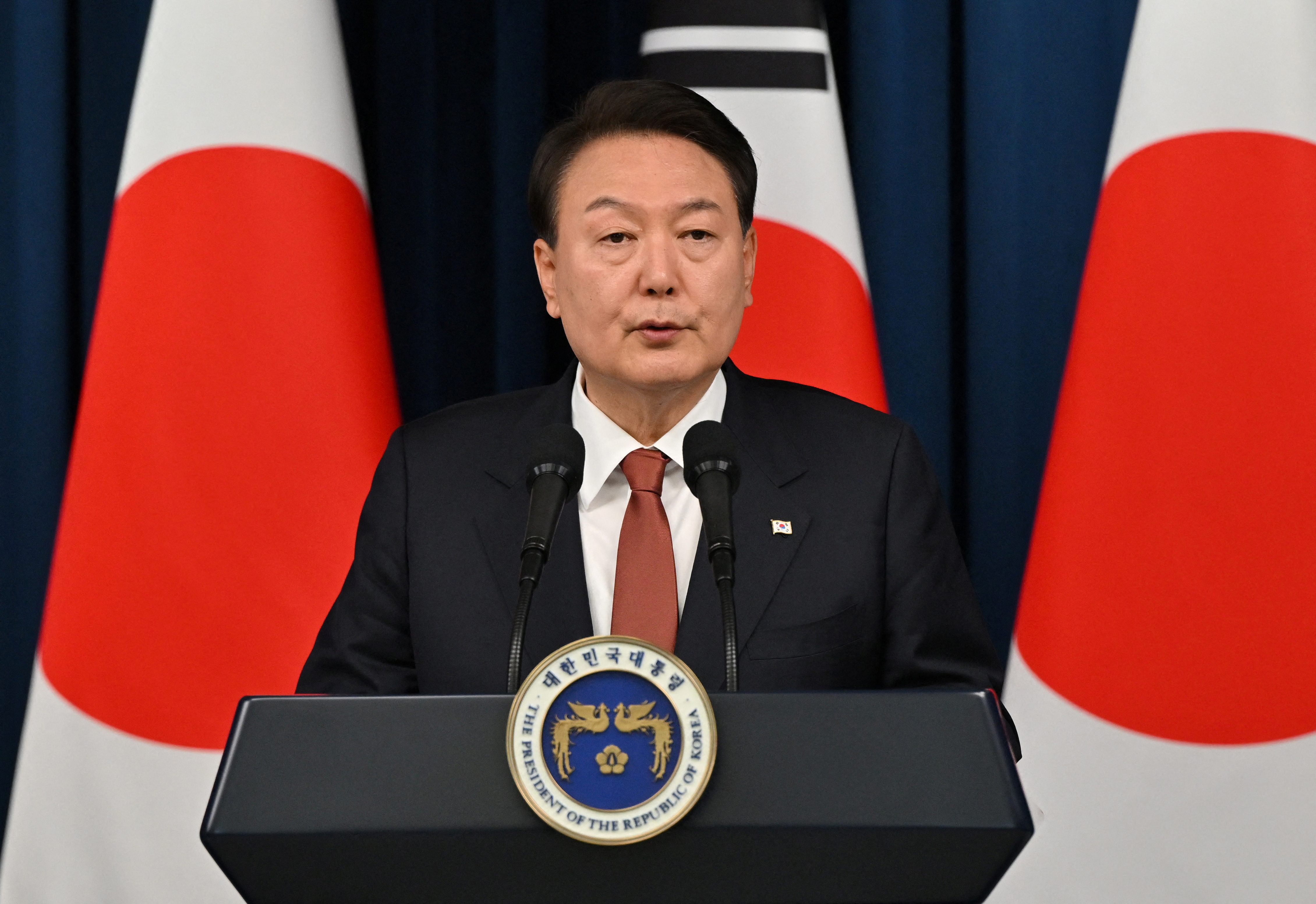 FILE PHOTO: South Korean President Yoon Suk Yeol speaks during a joint press conference with Japanese Prime Minister Fumio Kishida after their meeting at the presidential office in Seoul on May 7, 2023. Jung Yeon-je/Pool via REUTERS