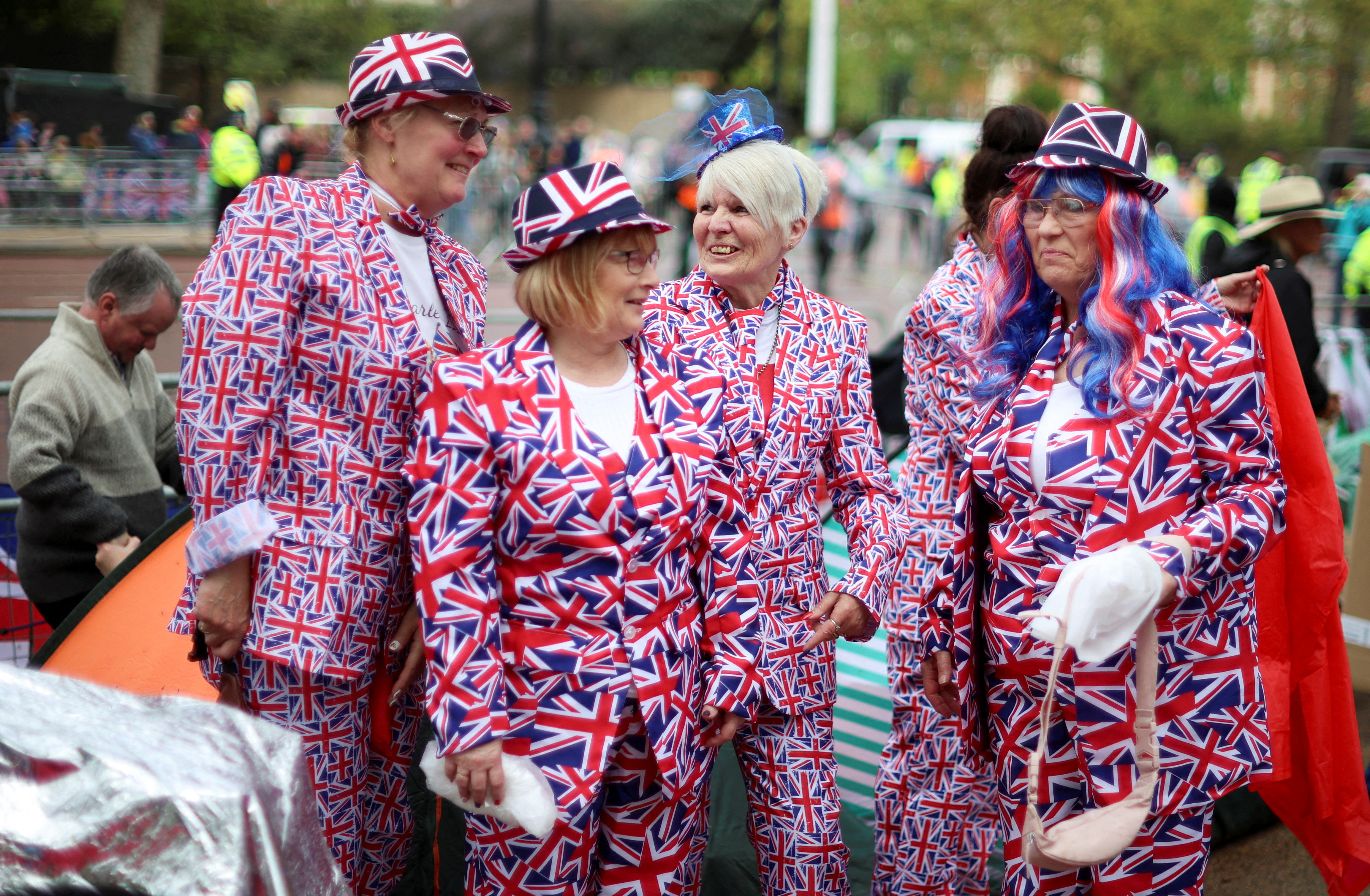 Well-wishers gather on the Mall outside Buckingham Palace ahead of the coronation of Britain's King Charles and Camilla, Queen Consort, in London, Britain, May 5, 2023. REUTERS/Phil Noble