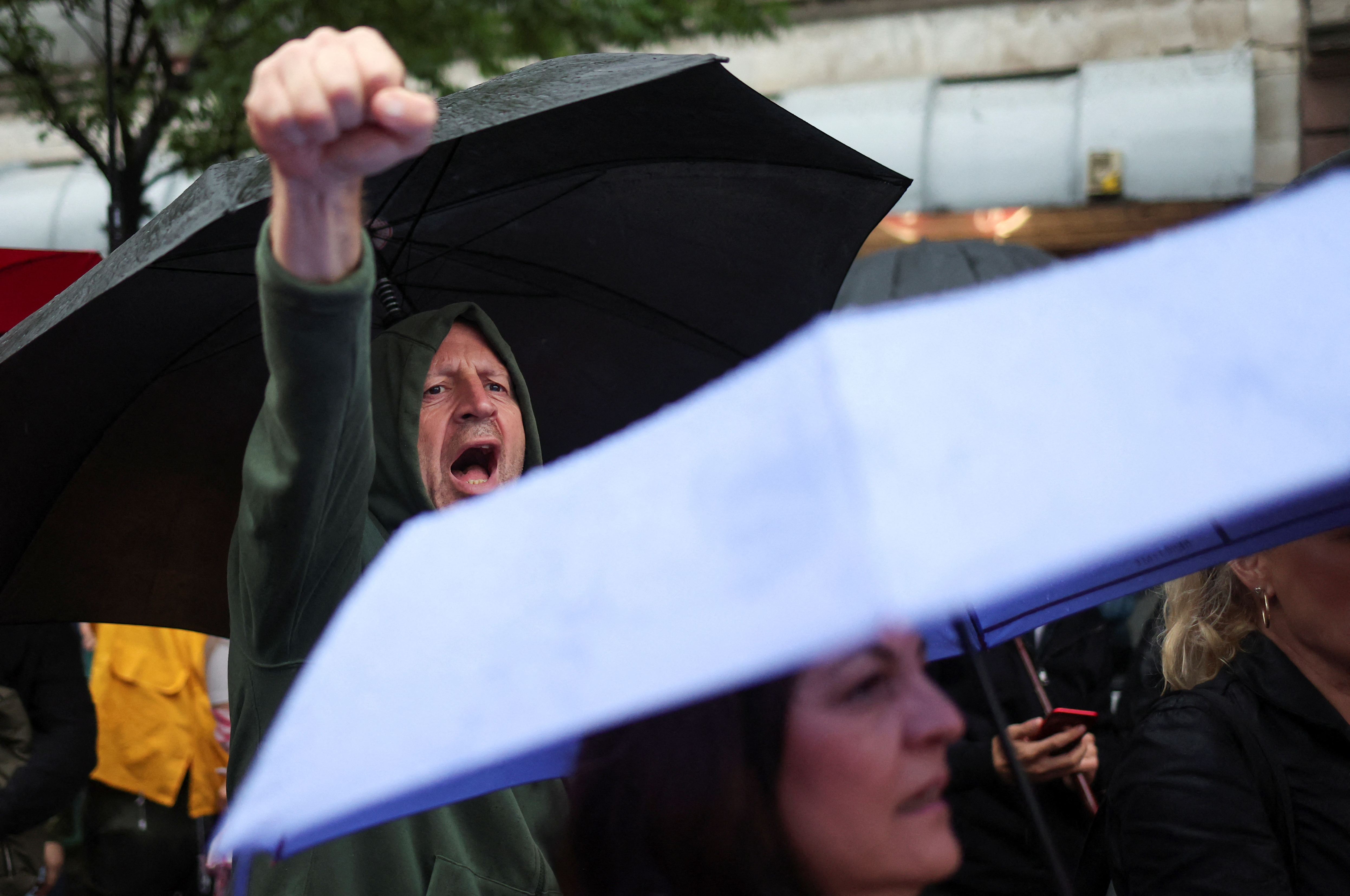 A man gestures during a protest "Serbia against violence" in reaction to the two mass shootings in the same week, that have shaken the country, in Belgrade, Serbia, May 27, 2023. REUTERS/Marko Djurica