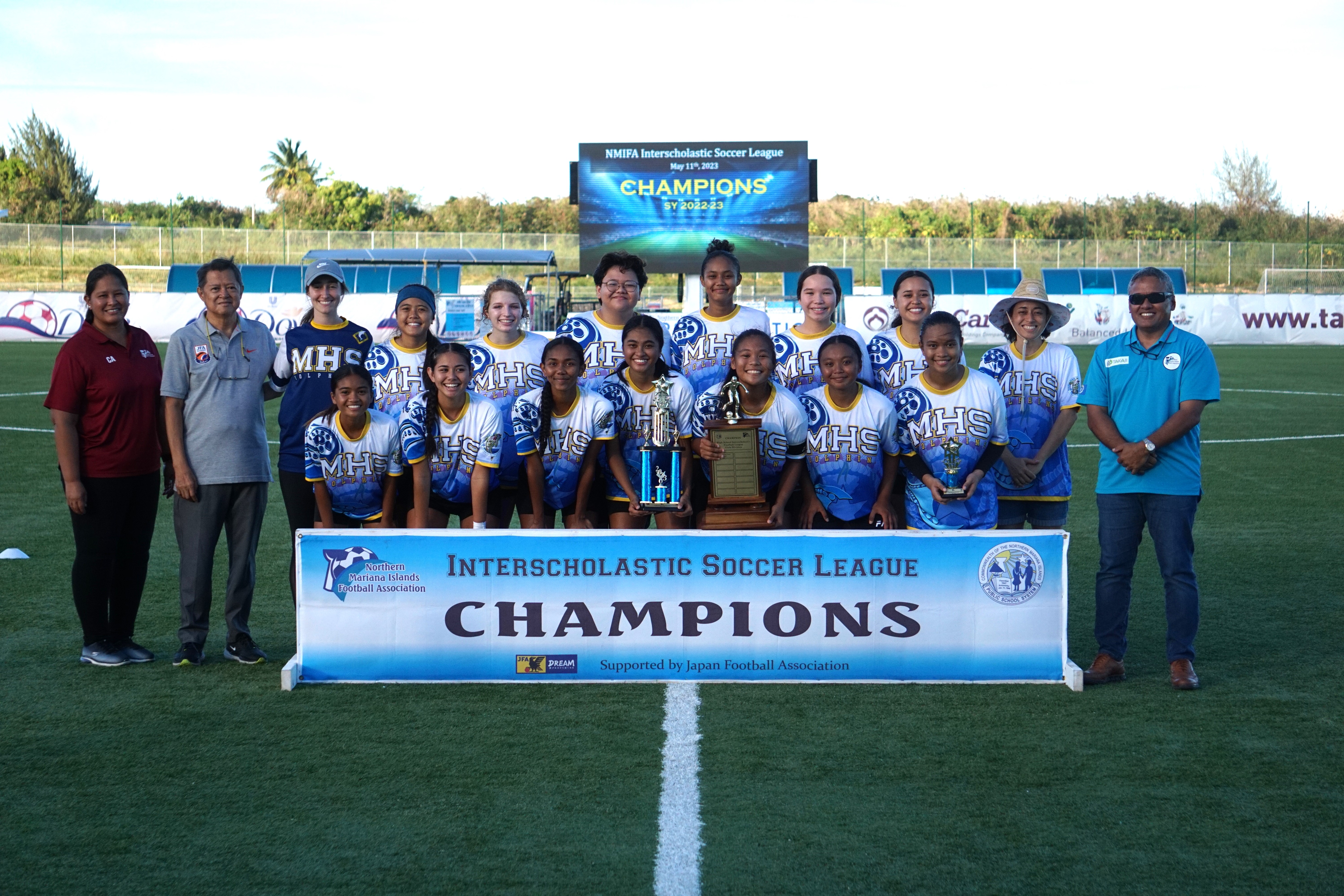 The Marianas High School team members pose with the girls high school division championship trophy during the awards ceremony of the NMIFA-PSS Interscholastic Soccer League Thursday at the NMI Soccer Training Center in Koblerville.