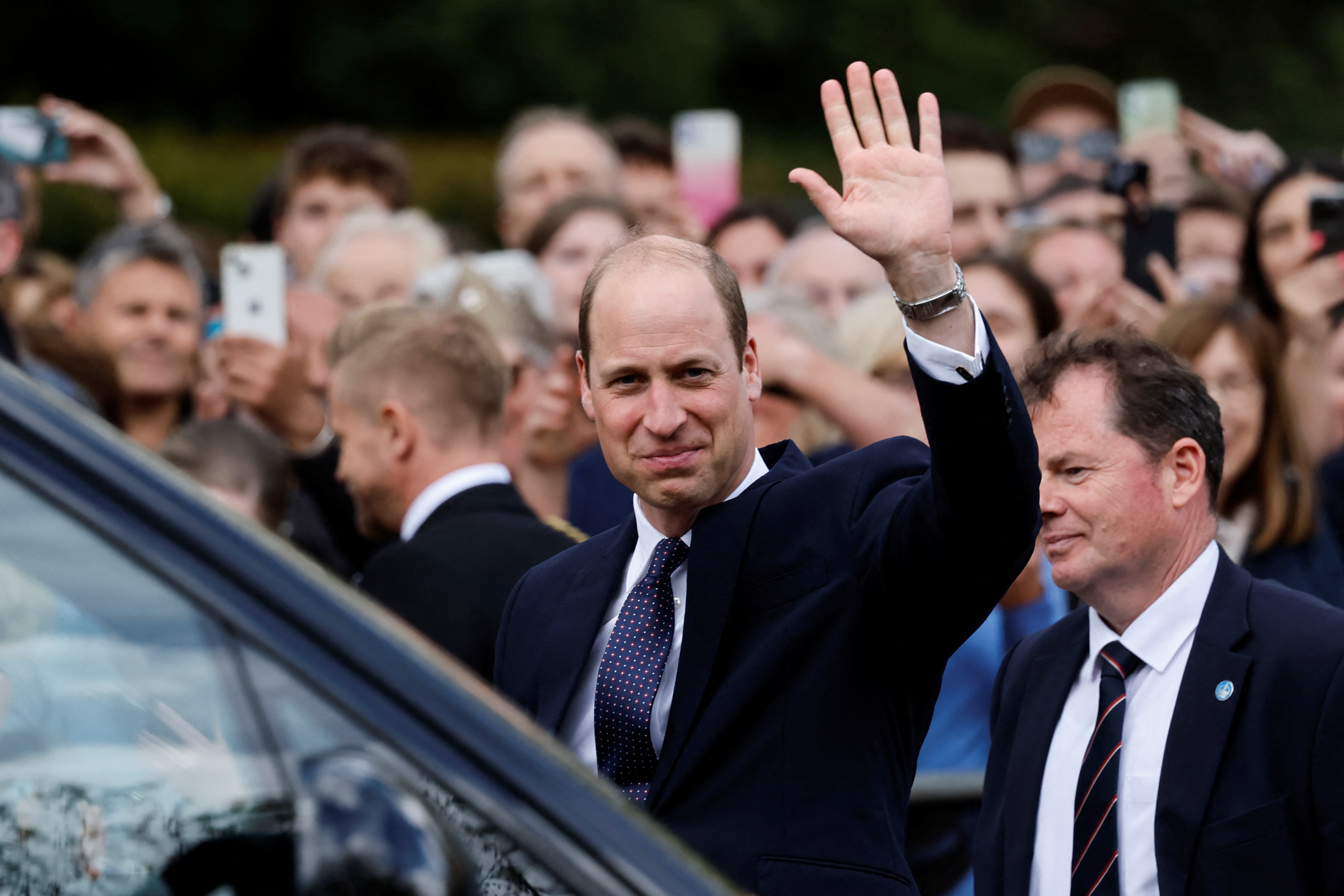 Britain's Prince William meets well-wishers during a walkabout on the Mall outside Buckingham Palace ahead of the coronation of Britain's King Charles and Camilla, Queen Consort, in London, Britain, May 5, 2023. REUTERS/Clodagh Kilcoyne