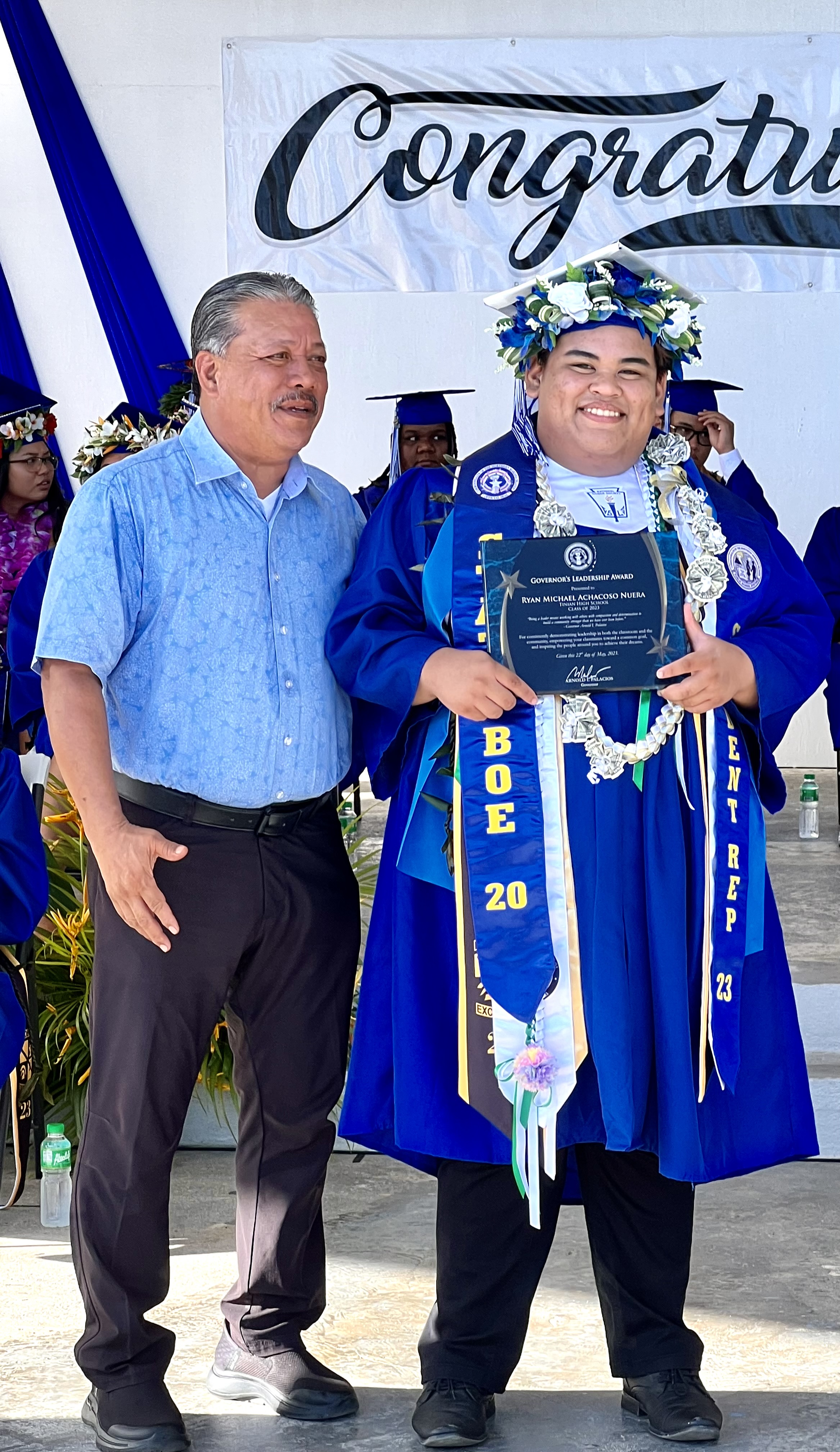 Tinian Mayor Edwin Aldan presented the Governor’s Award to valedictorian Ryan Michael Nuera.