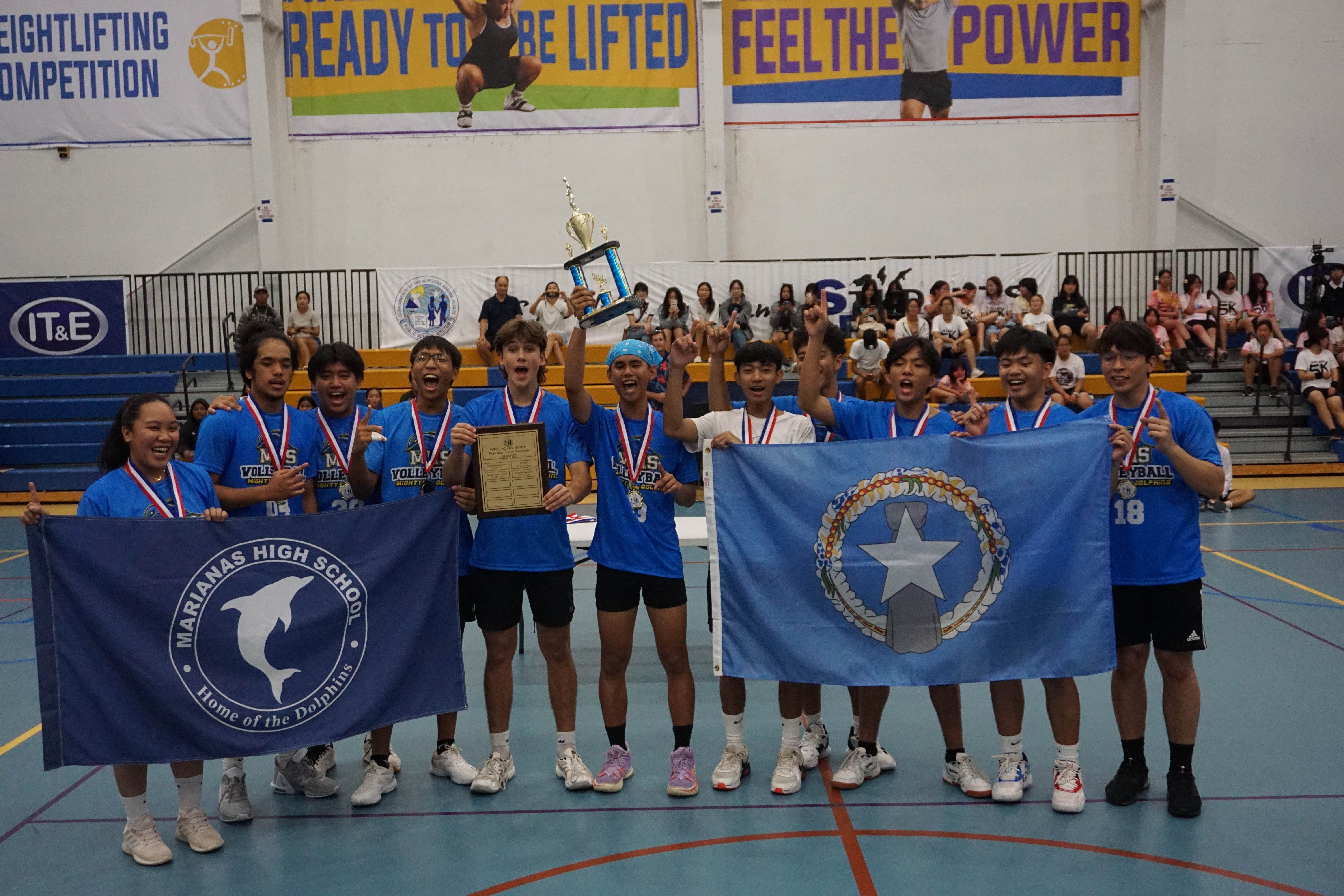 Marianas High School celebrates after winning the championship in the boys high school division of the PSS-NMIVA Interscholastic Volleyball League at the MHS gym on Saturday.