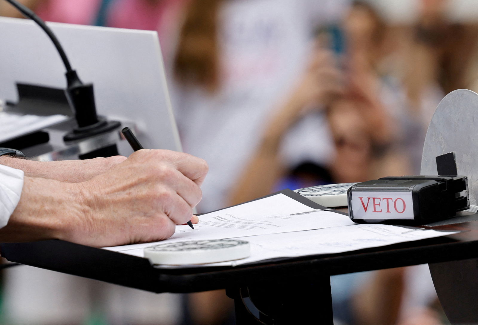 FILE PHOTO: North Carolina Governor Roy Cooper vetoes the SB20 legislation limiting most abortions to the first trimester of pregnancy, a sharp drop from the state's current limit of 20 weeks gestation, in Raleigh, North Carolina, U.S. May 13, 2023. REUTERS/Jonathan Drake